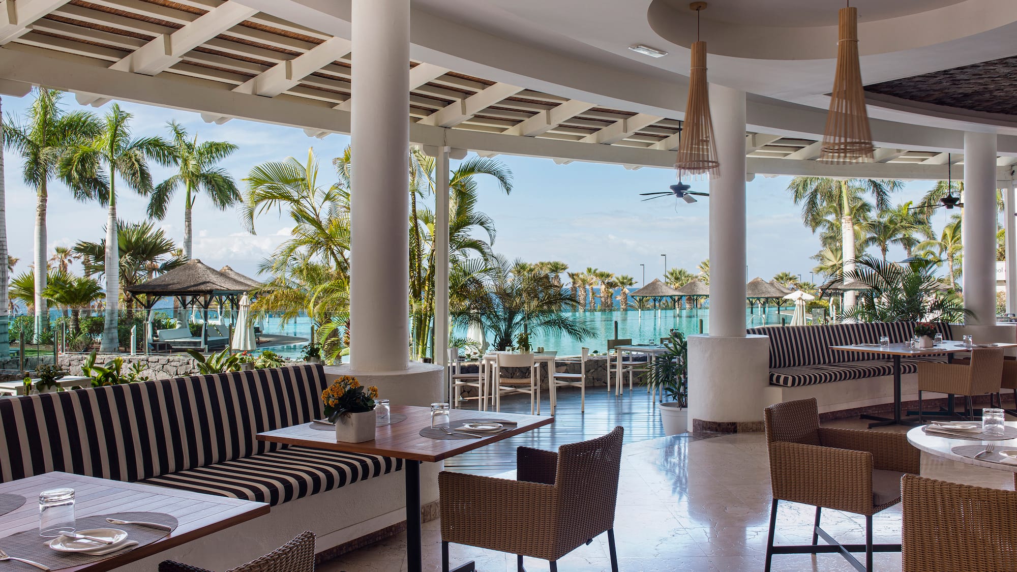 a restaurant with tables and chairs