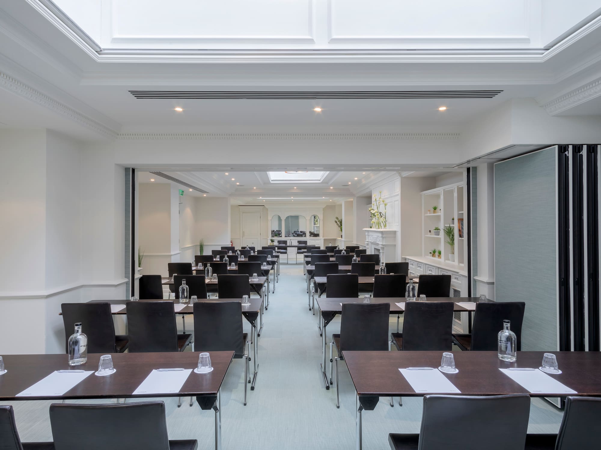 a room with tables and chairs