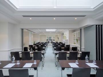 a room with tables and chairs