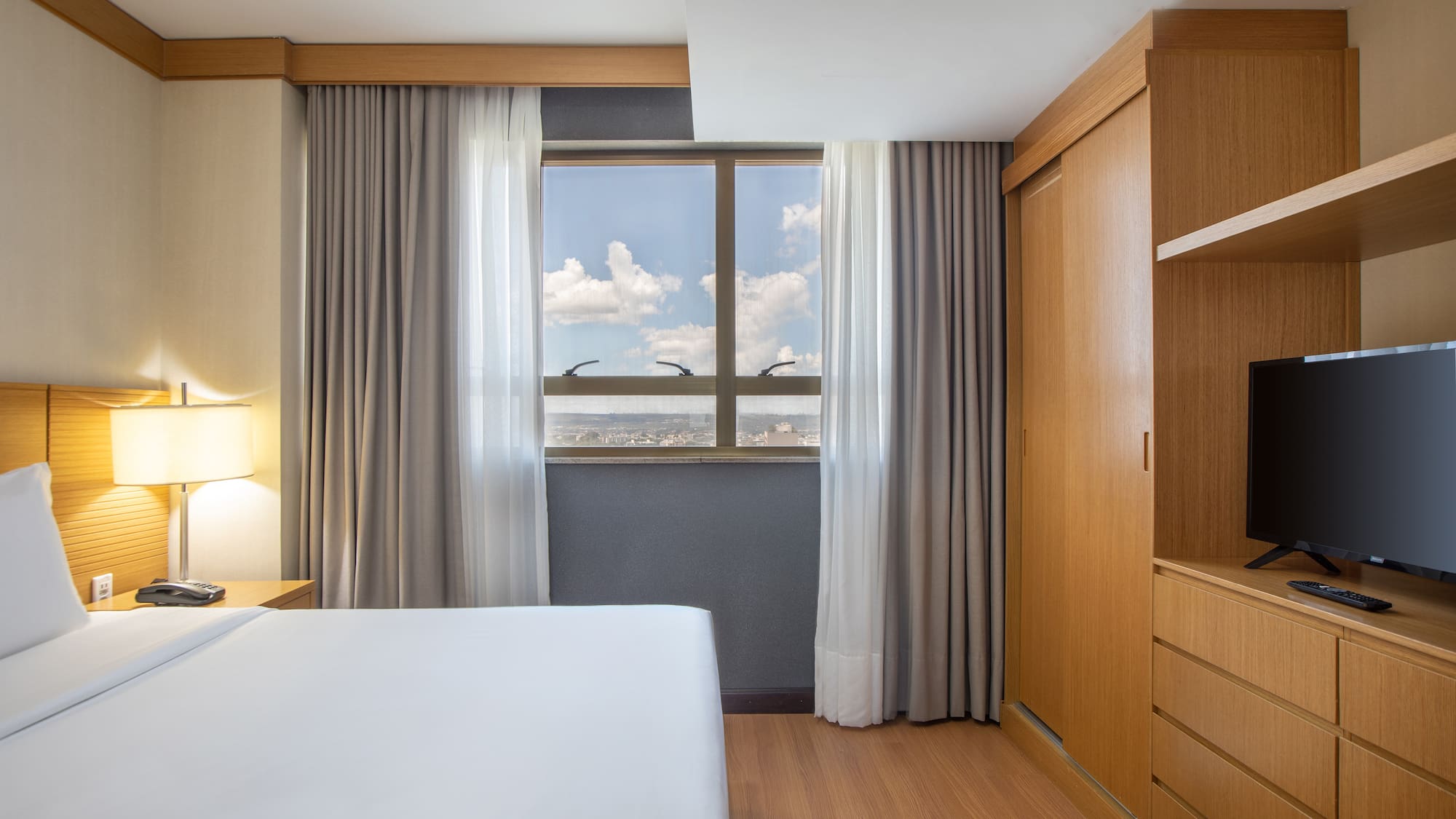 a room with a bed and a closet