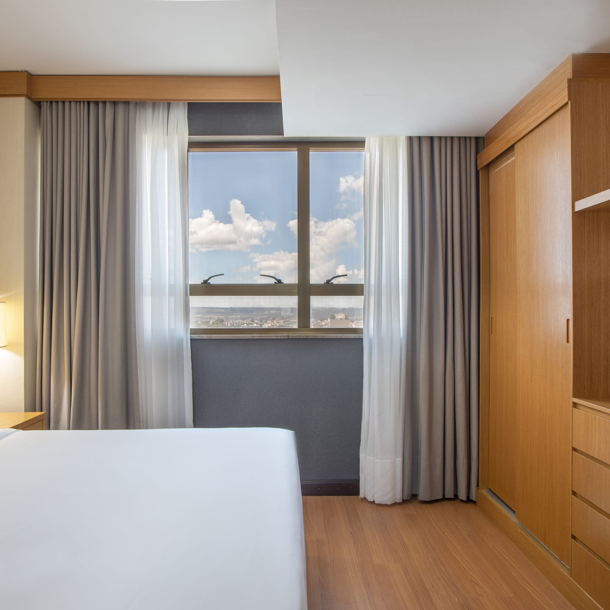 a room with a bed and a closet