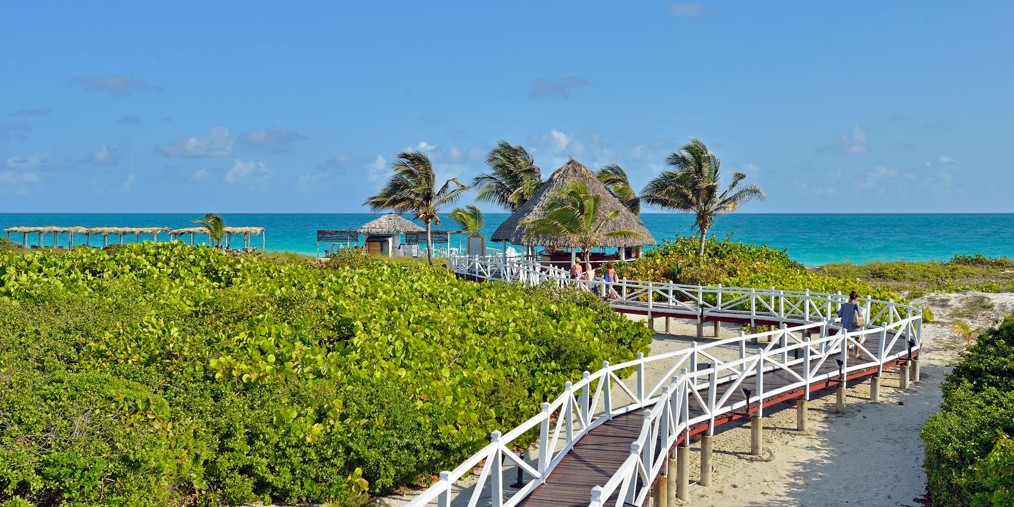 a walkway leading to a beach