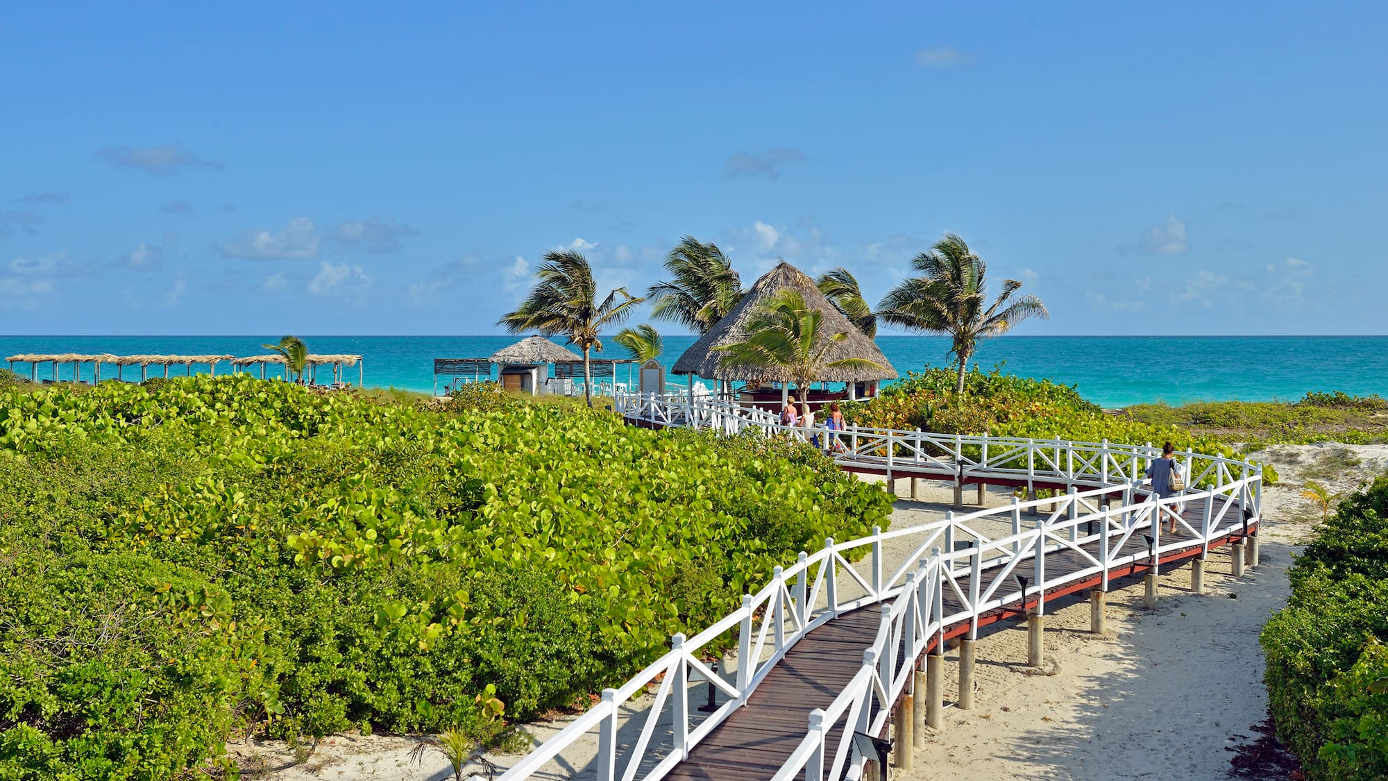 a walkway leading to a beach
