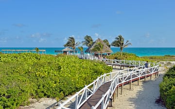 a walkway leading to a beach