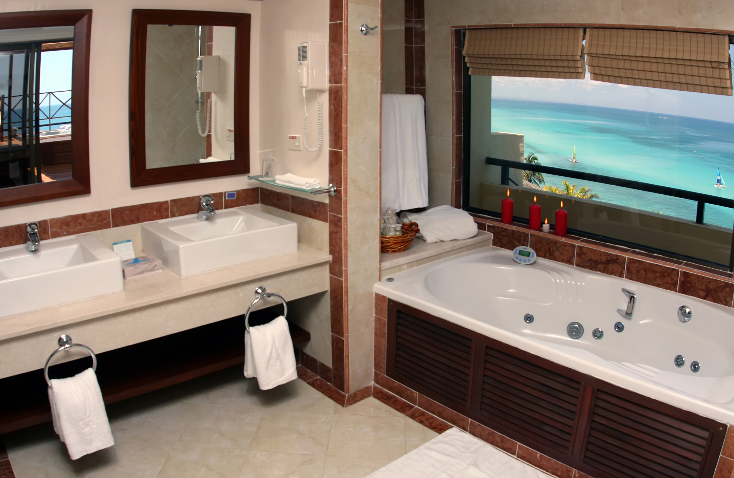 a bathroom with a bathtub and a mirror
