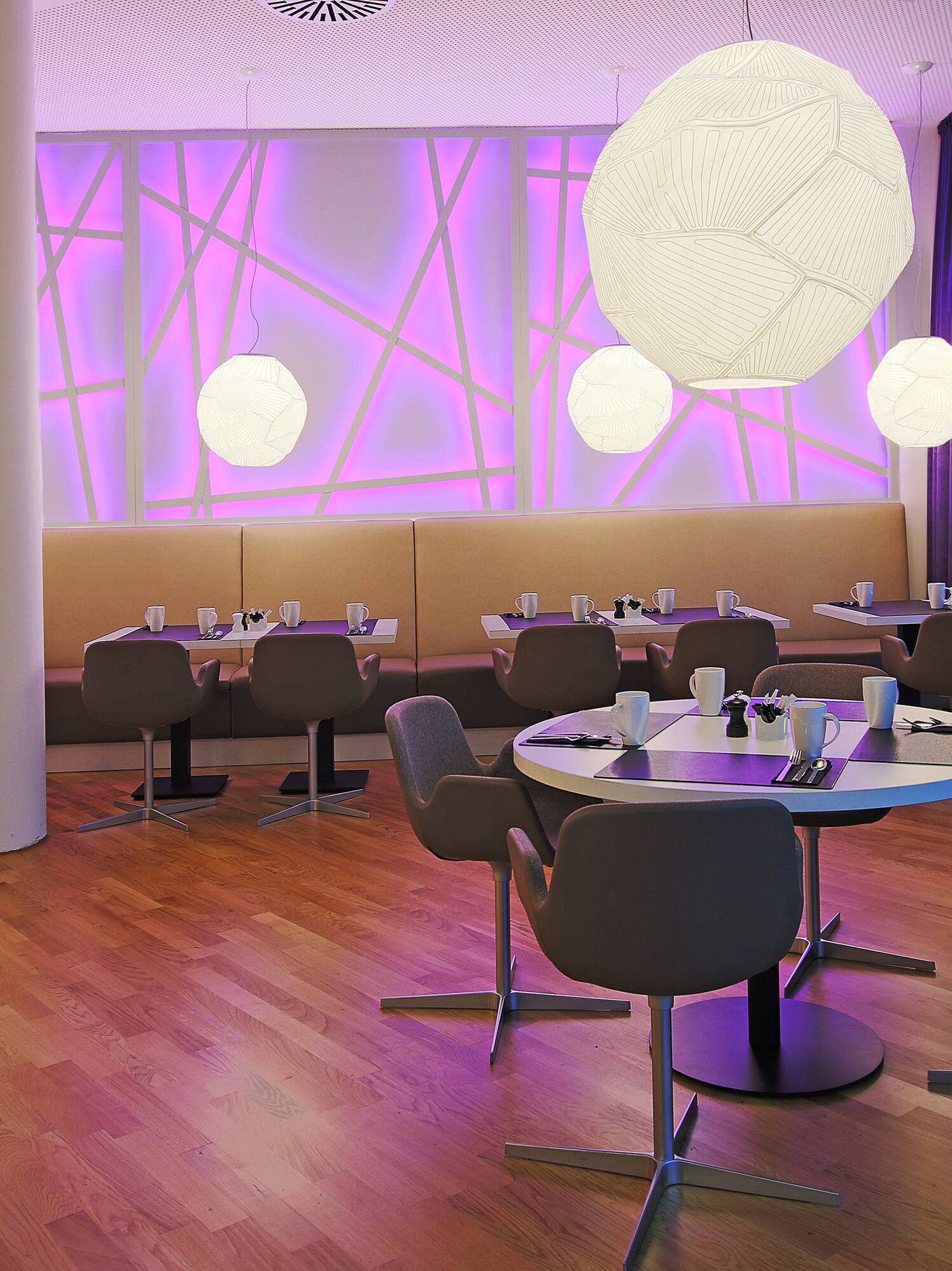 a restaurant with tables and chairs