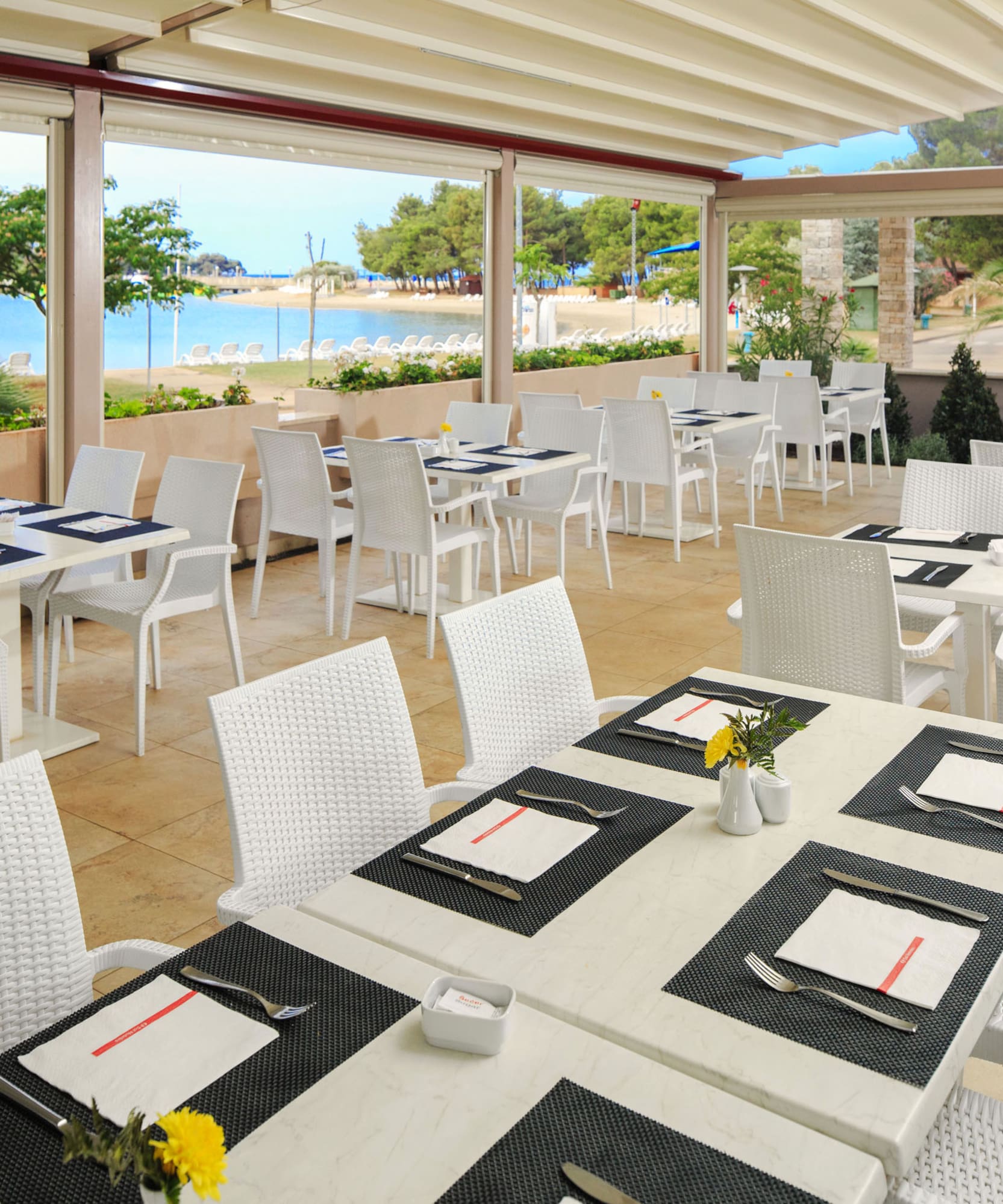a restaurant with tables and chairs