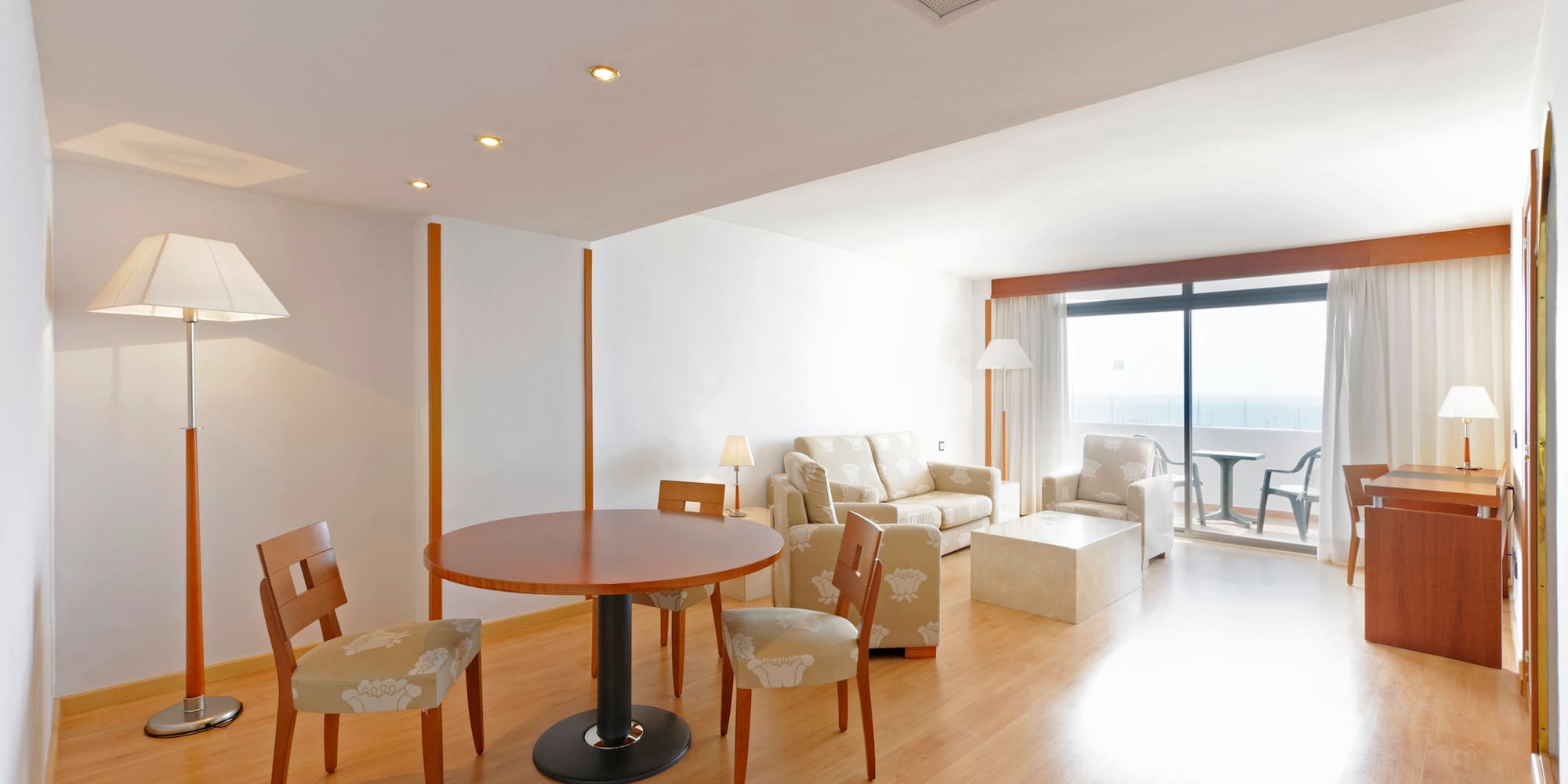 a room with a table and chairs