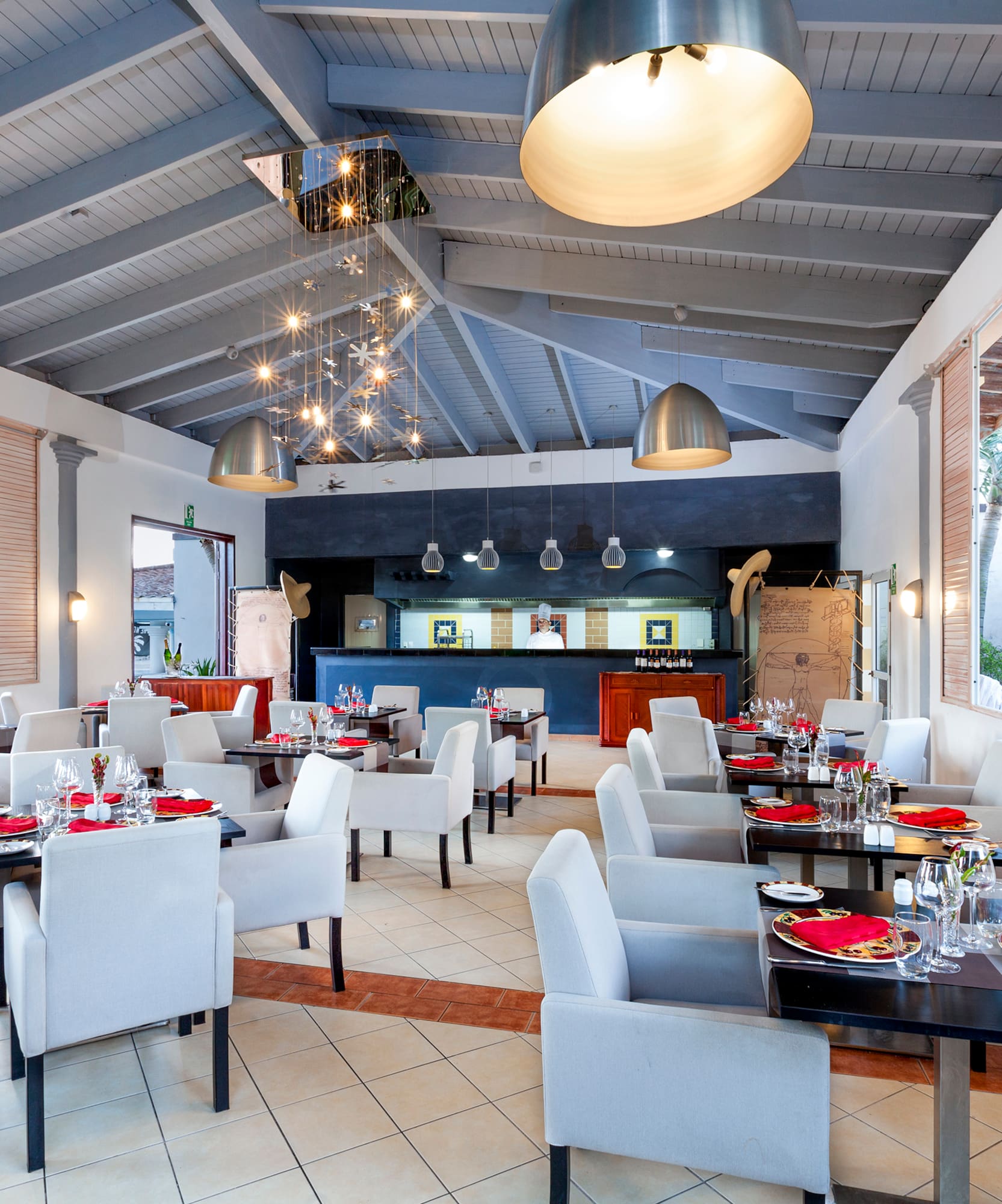 a restaurant with tables and chairs