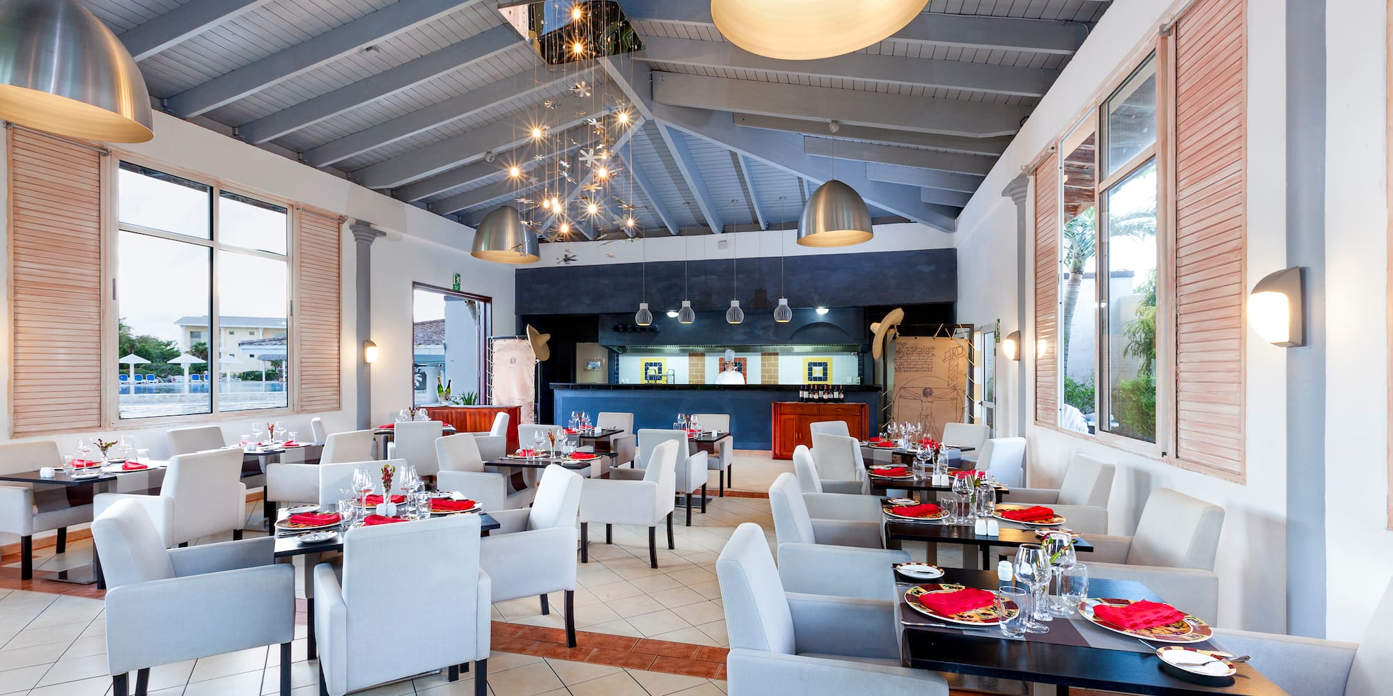 a restaurant with tables and chairs