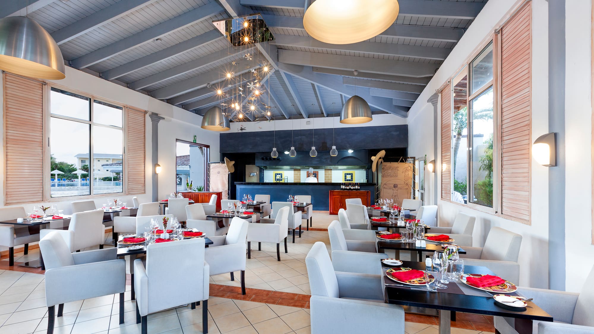 a restaurant with tables and chairs