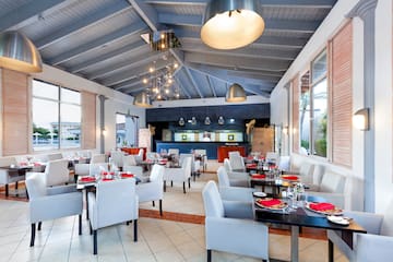 a restaurant with tables and chairs