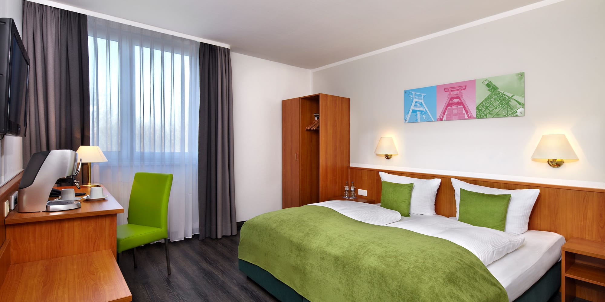 a room with a bed and a desk