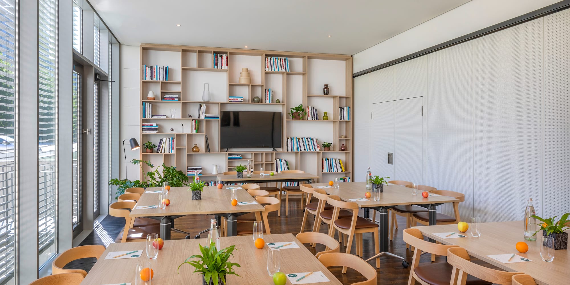 a room with tables and chairs