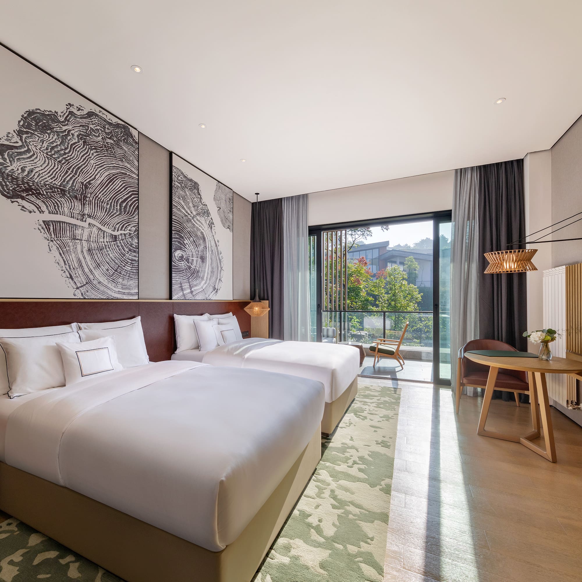 a hotel room with two beds