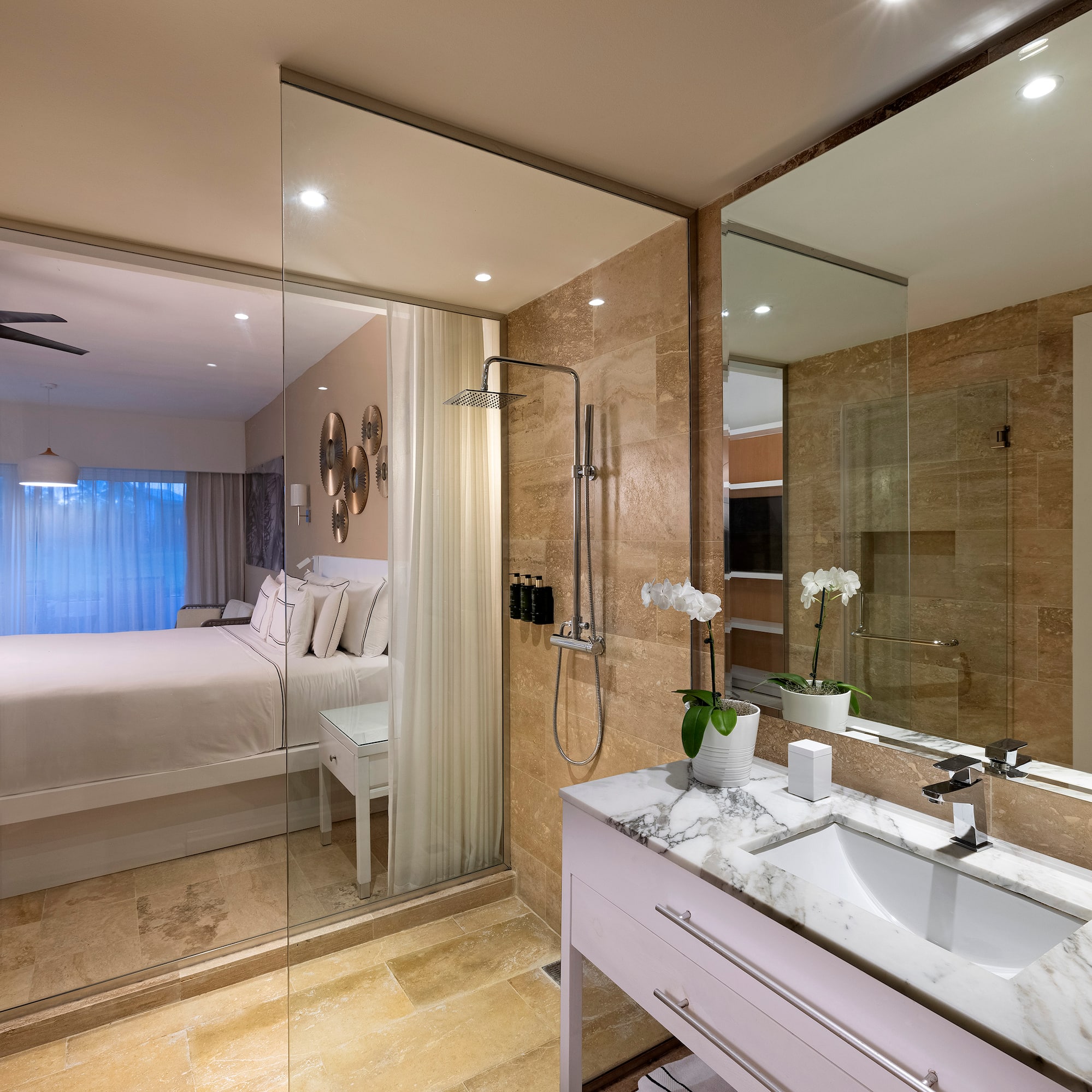 a bathroom with a bed and shower
