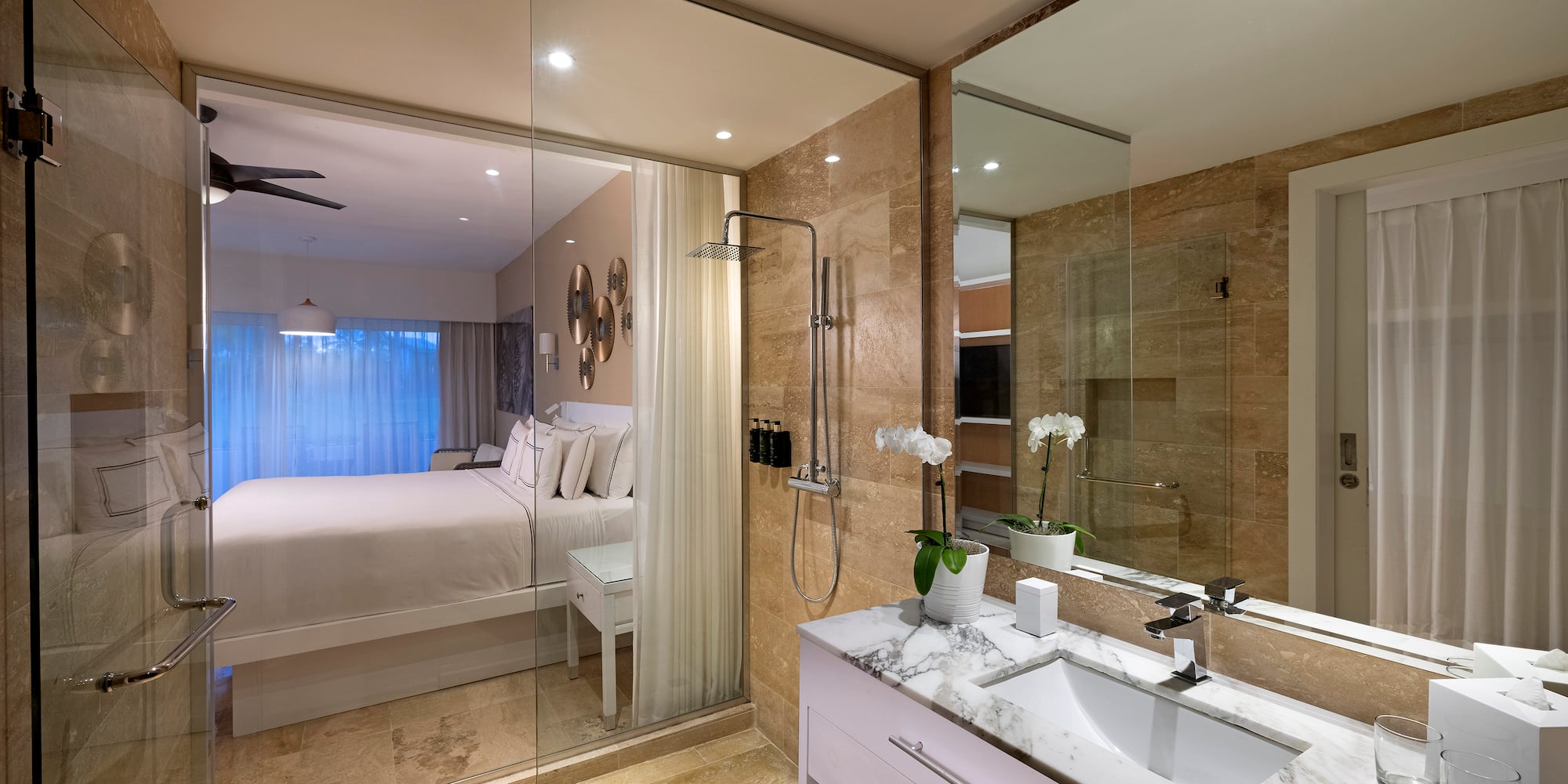 a bathroom with a bed and shower