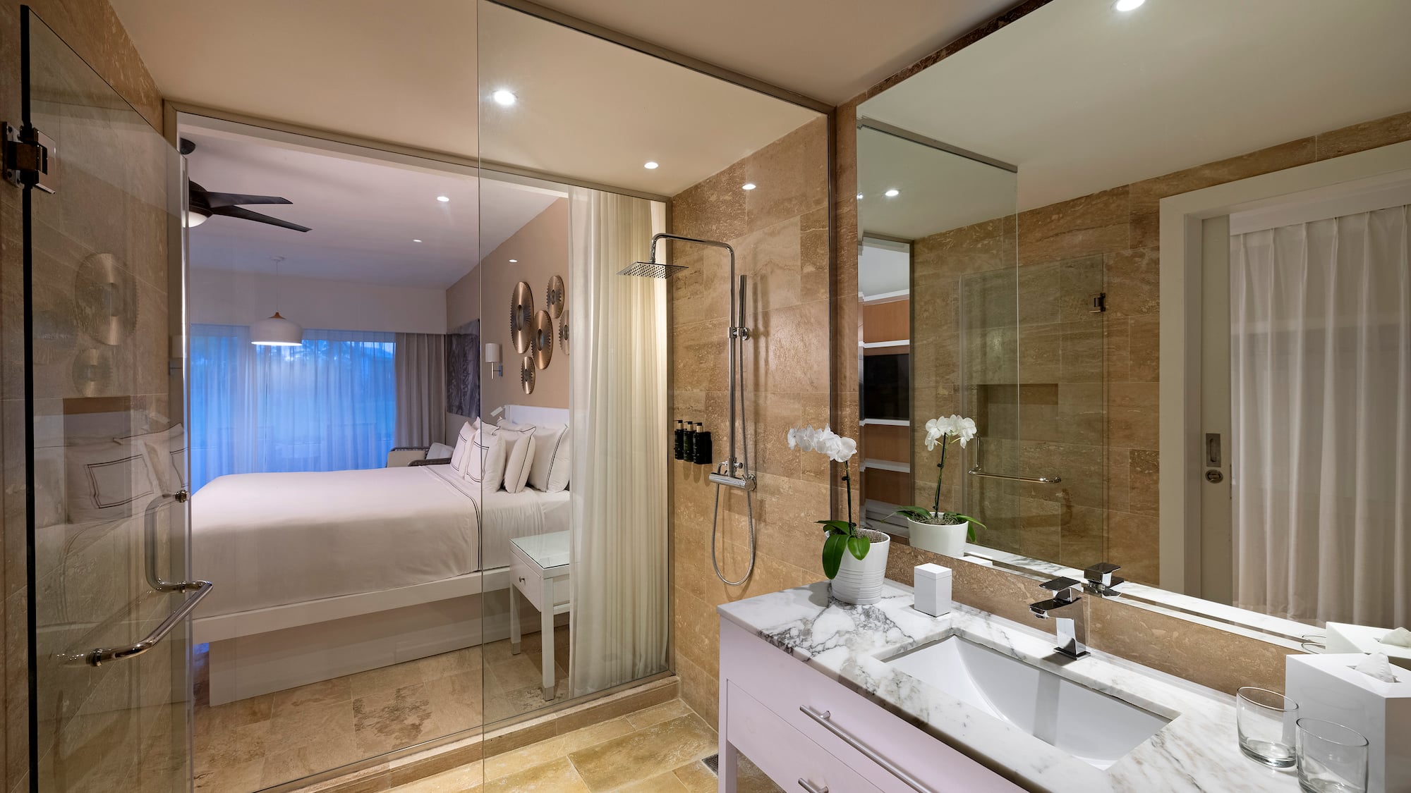 a bathroom with a bed and shower