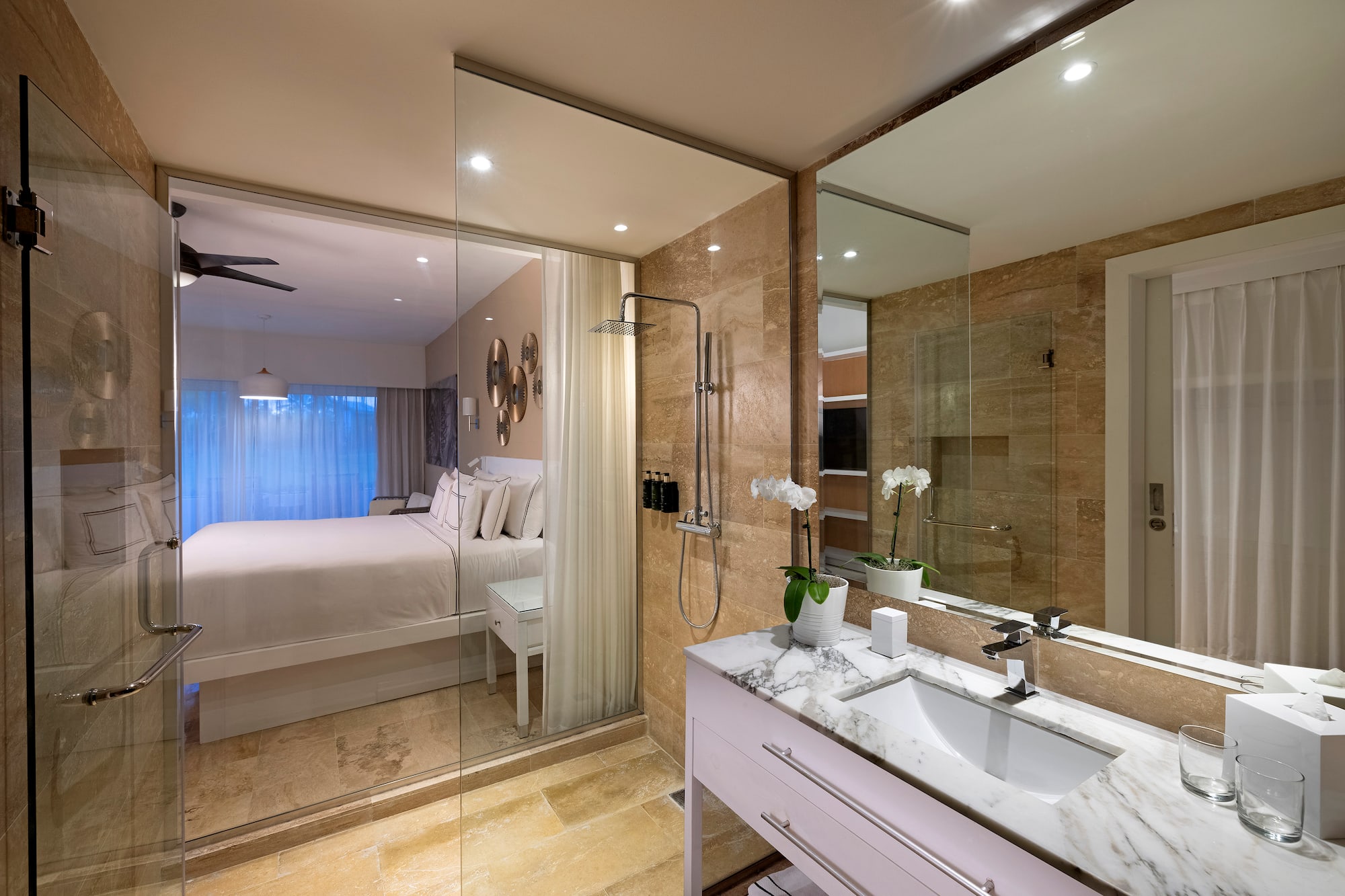a bathroom with a bed and shower