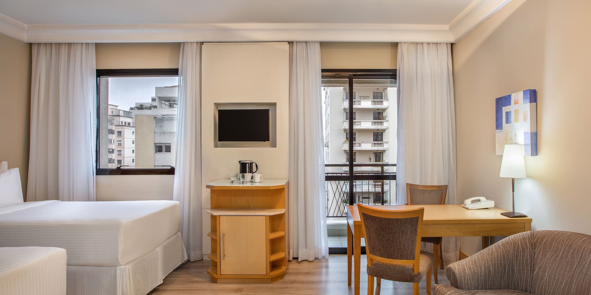 a room with a table and chairs