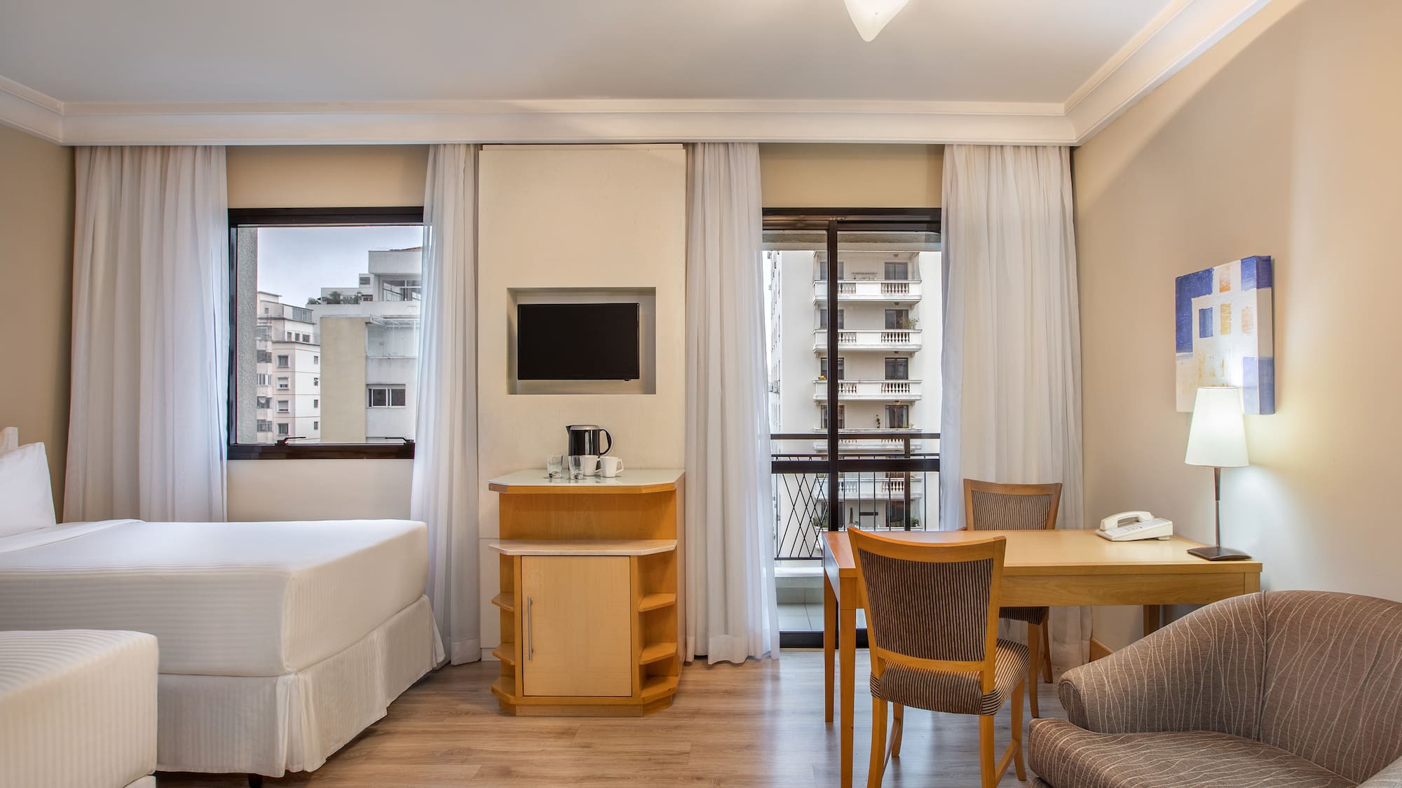 a room with a table and chairs