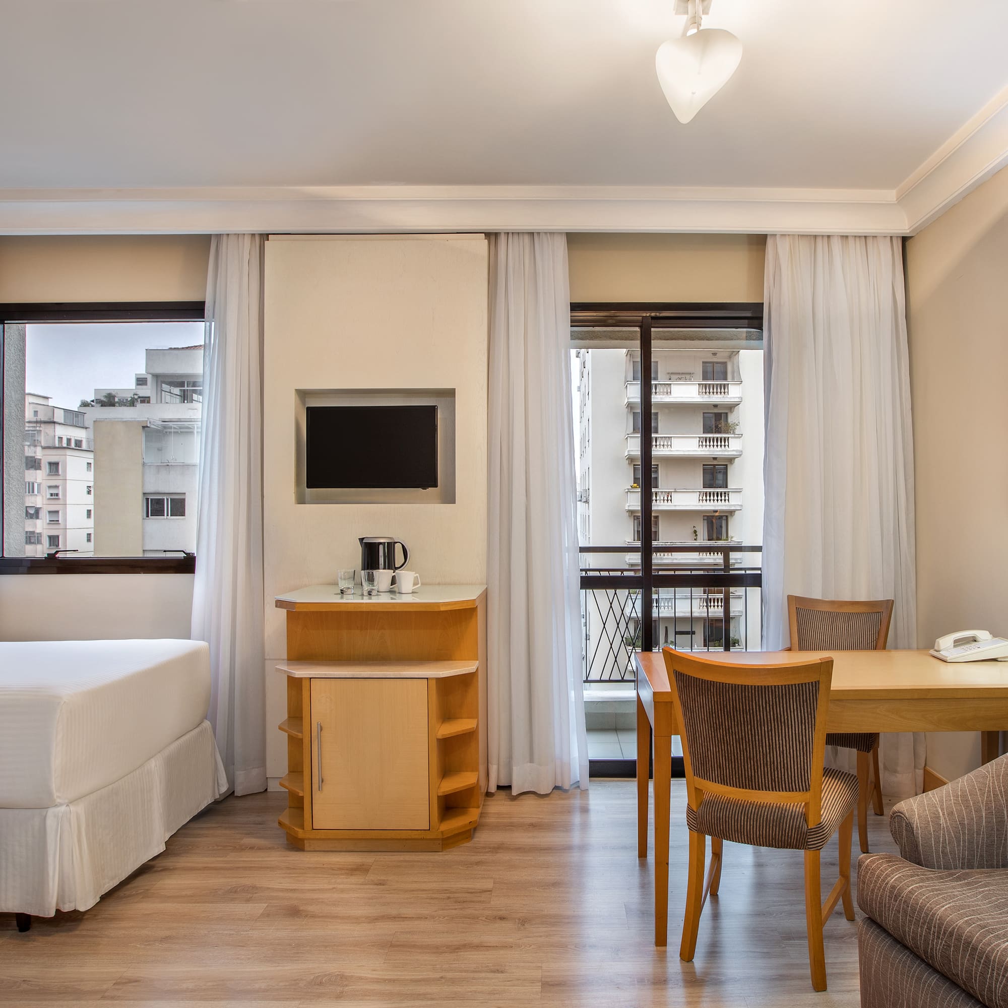 a room with a table and chairs