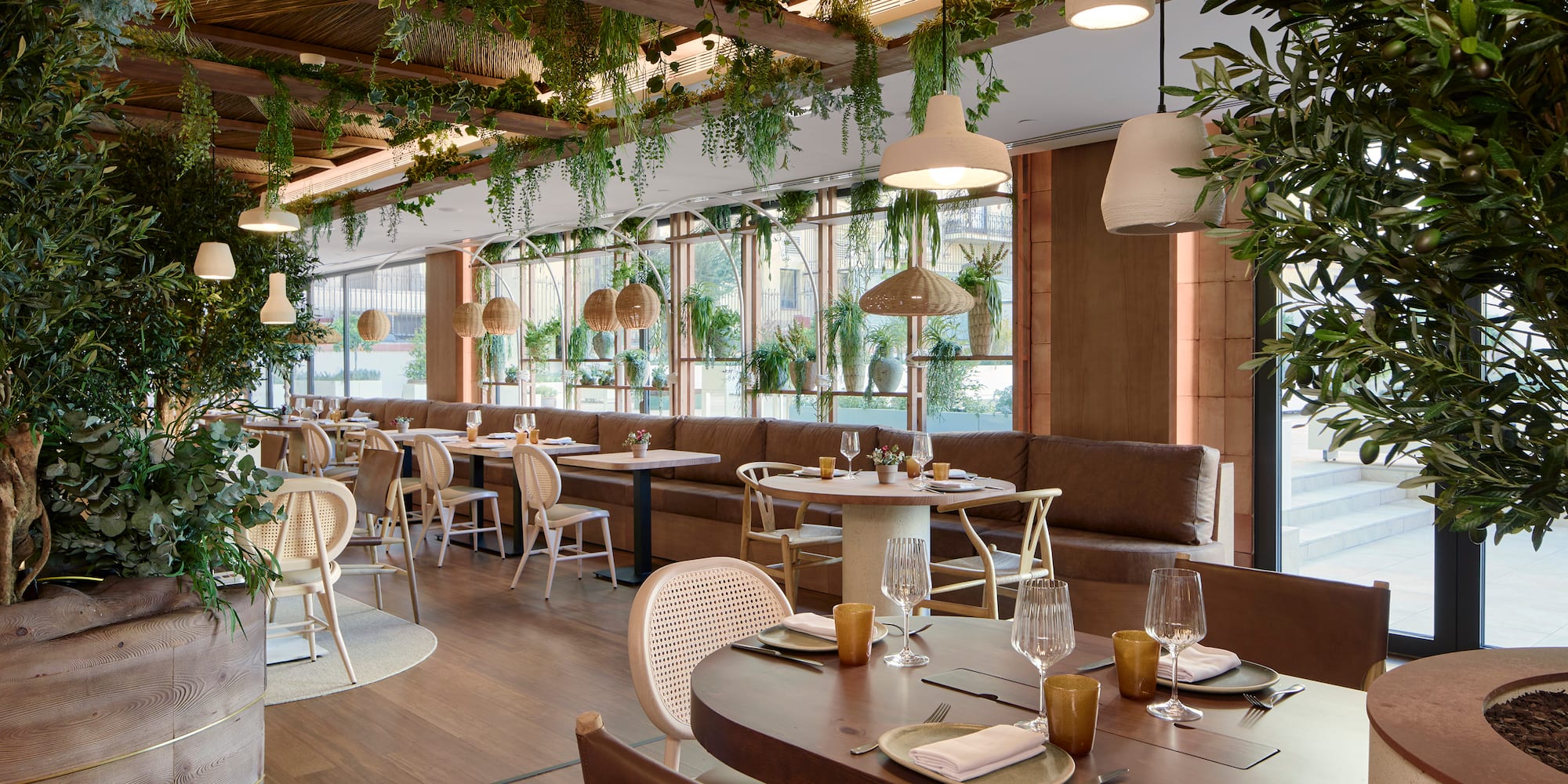 a restaurant with tables and chairs