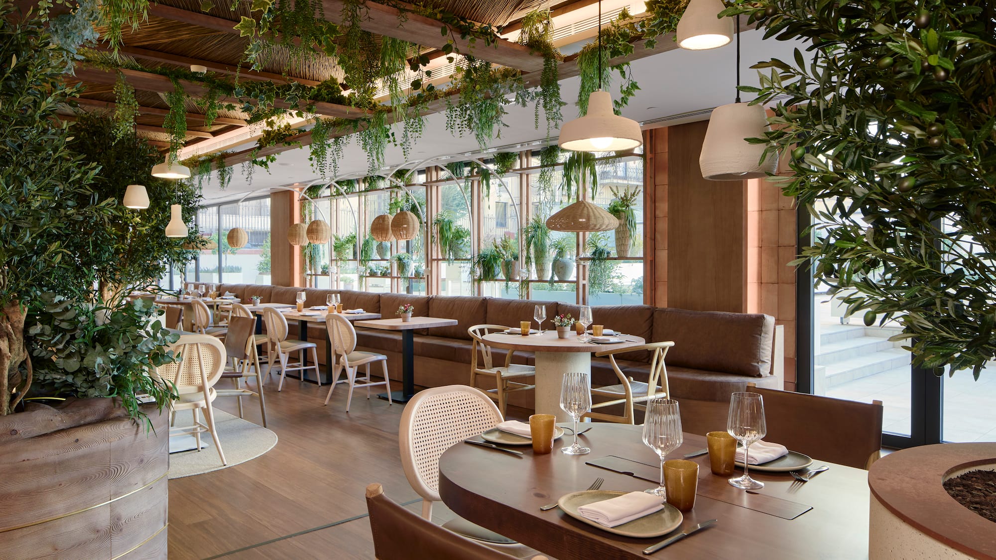 a restaurant with tables and chairs