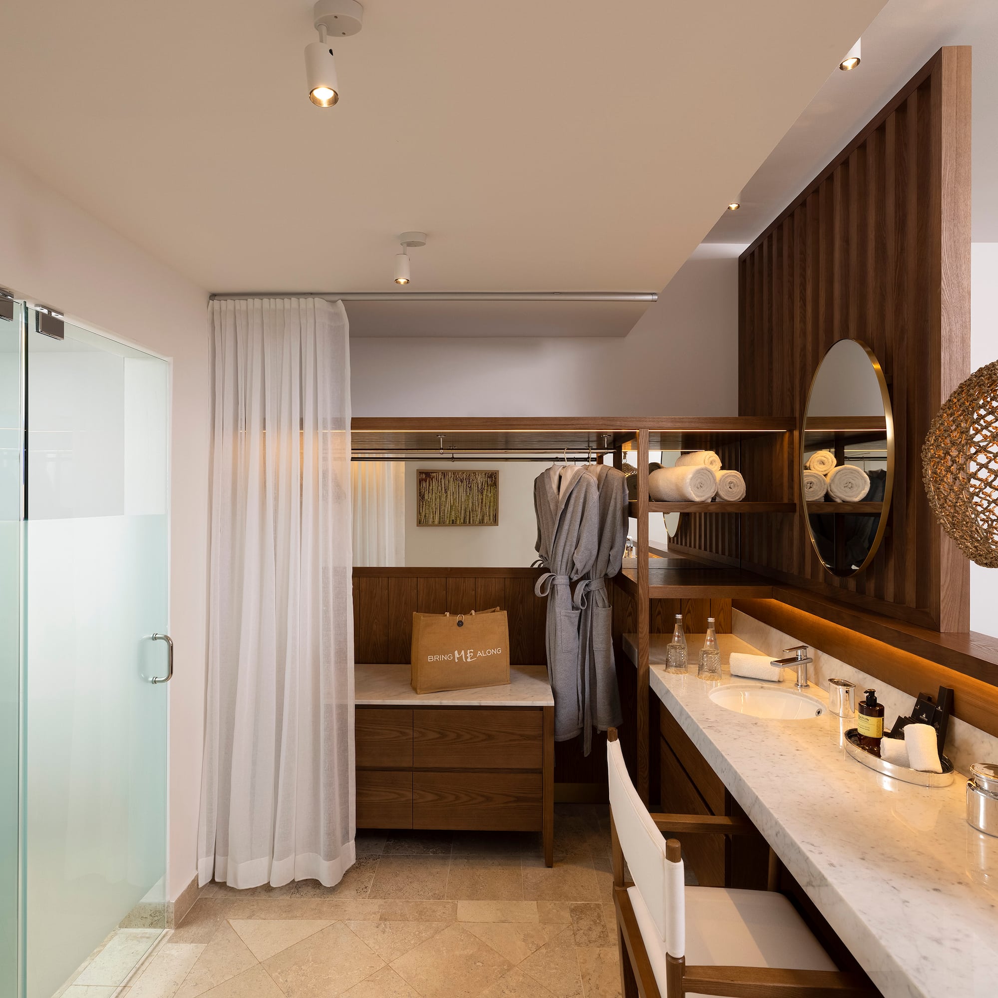 a bathroom with a mirror and sink