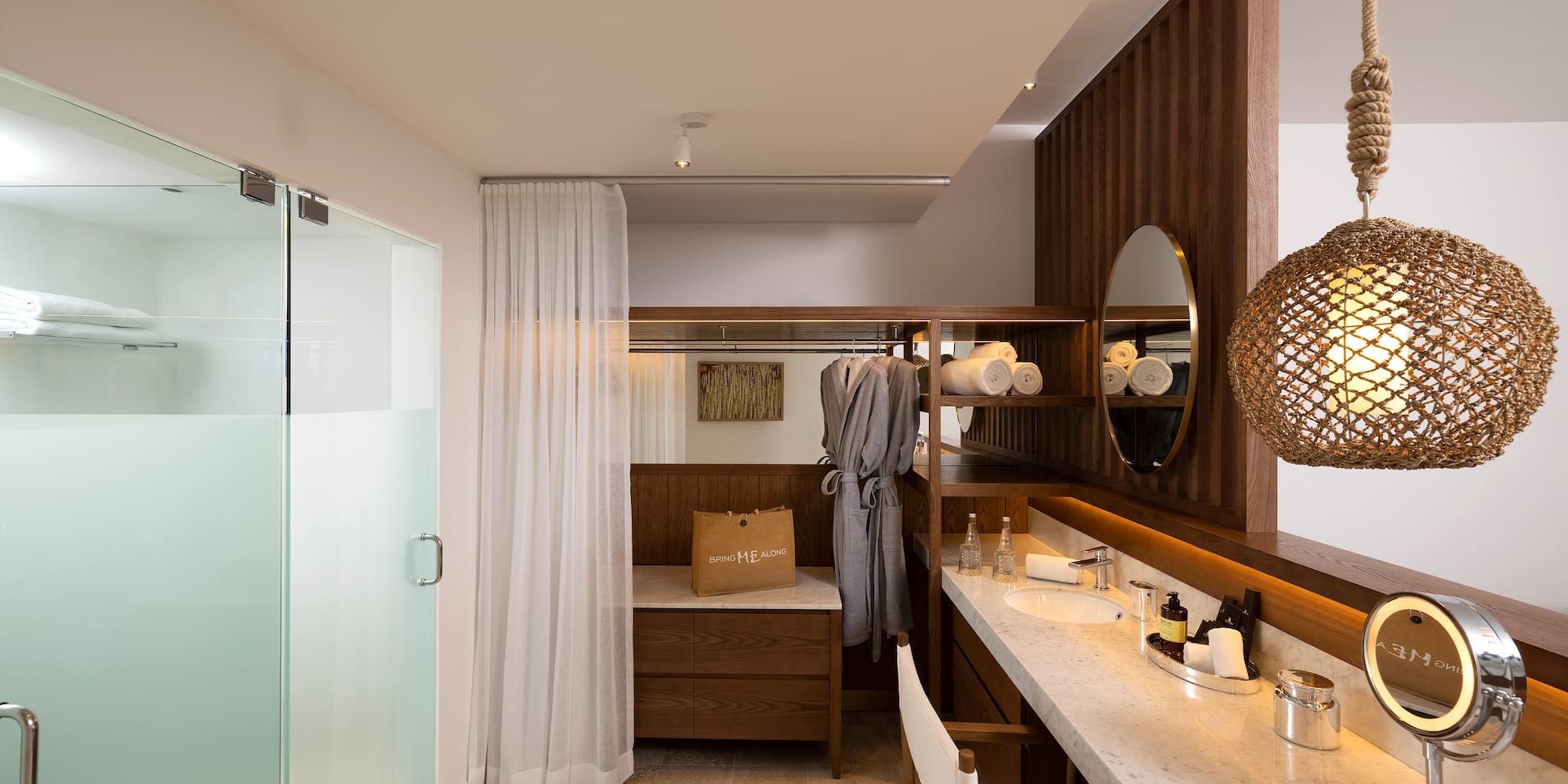 a bathroom with a mirror and sink