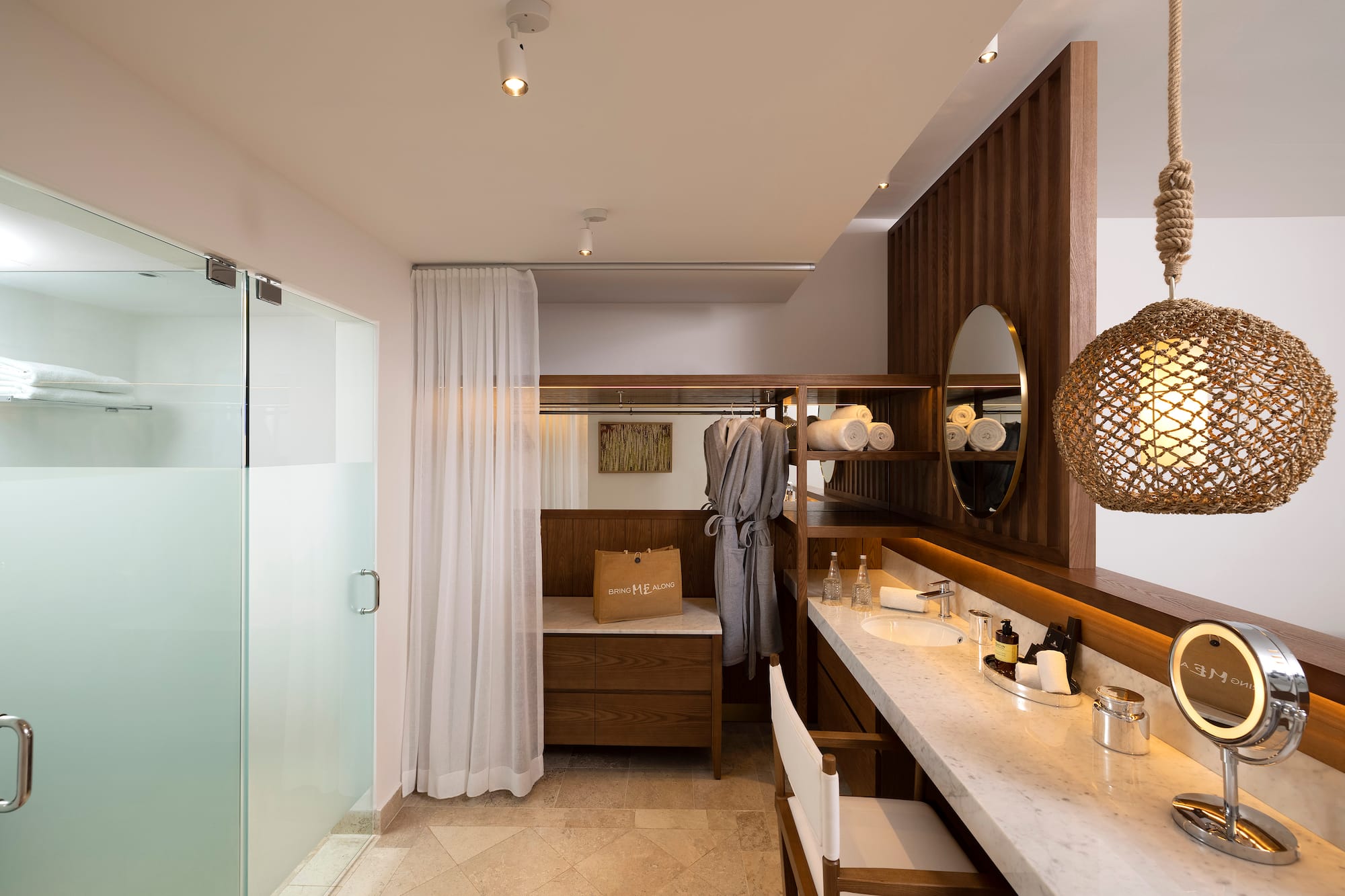 a bathroom with a mirror and sink