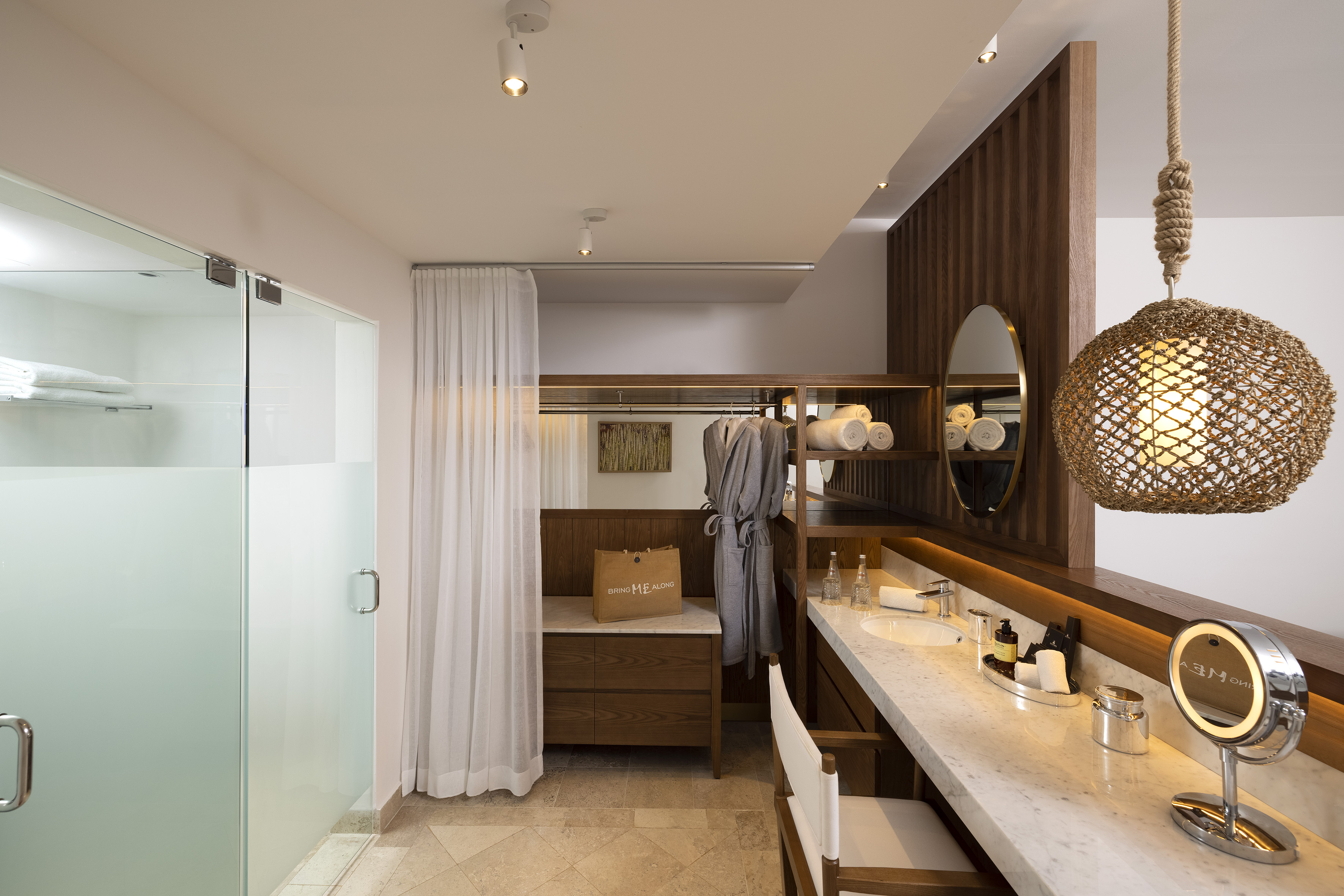 a bathroom with a mirror and sink