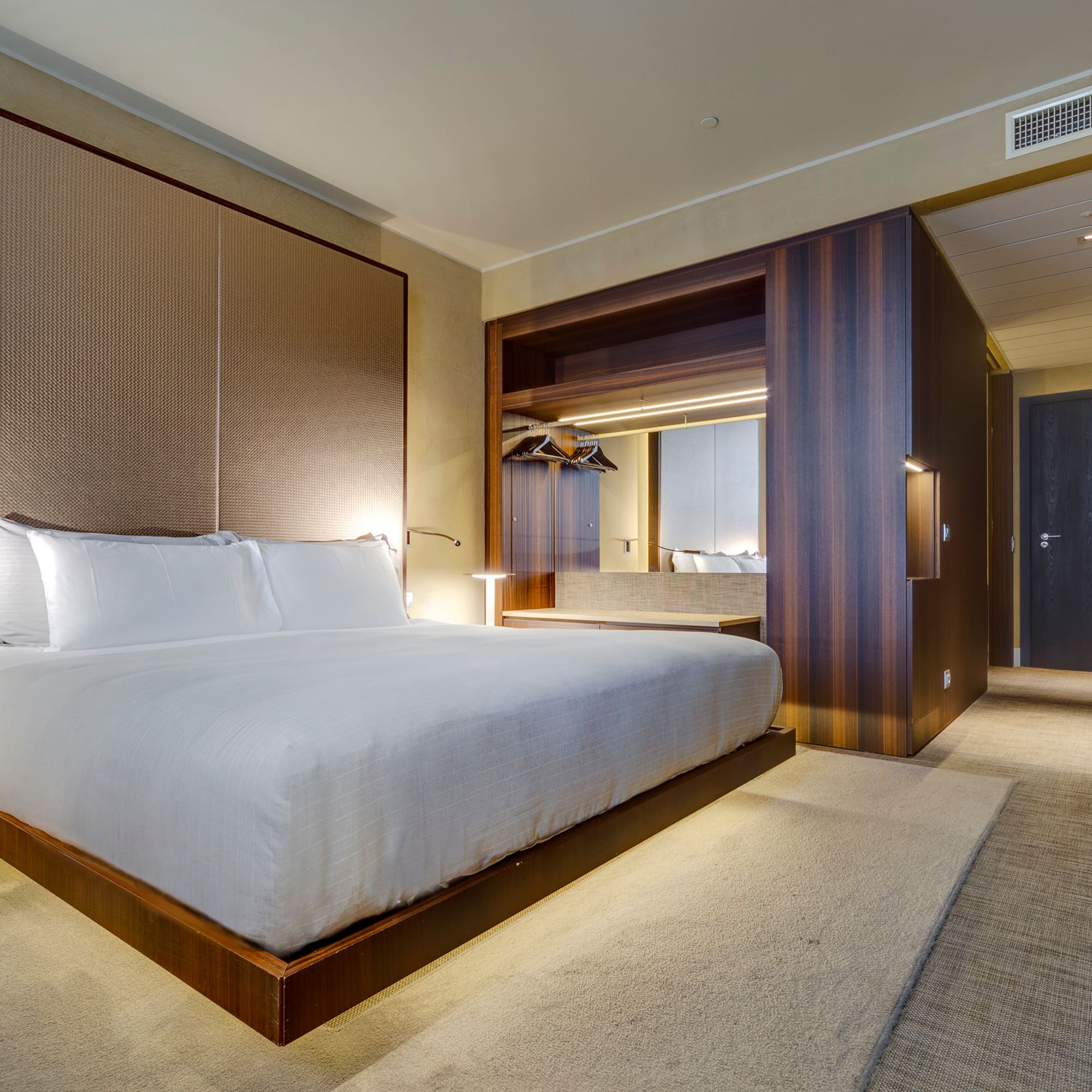 a room with a bed and a closet