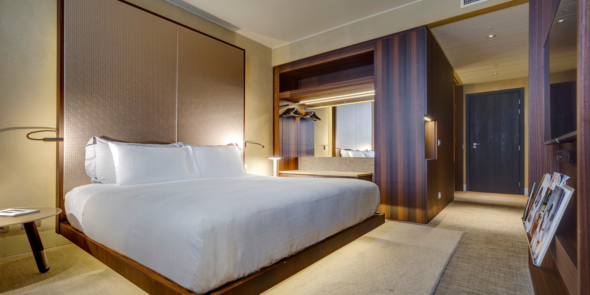 a room with a bed and a closet