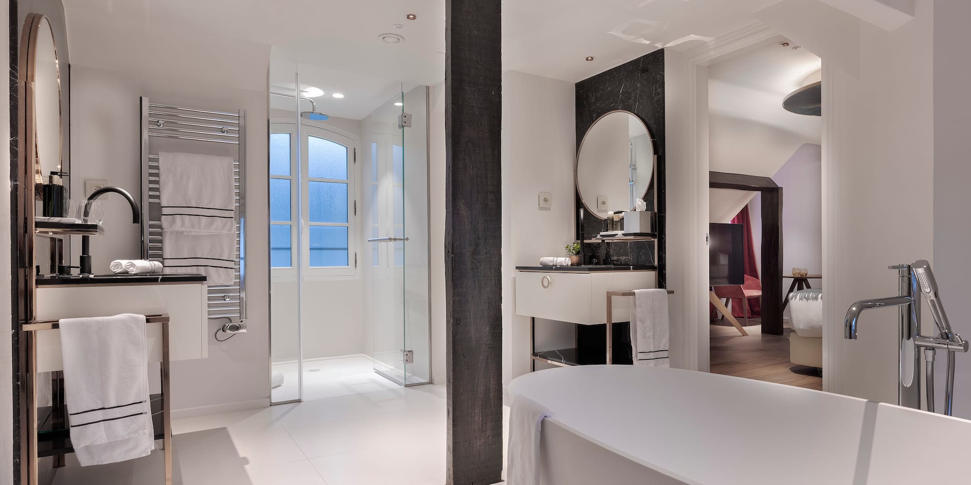 a bathroom with a tub and sink