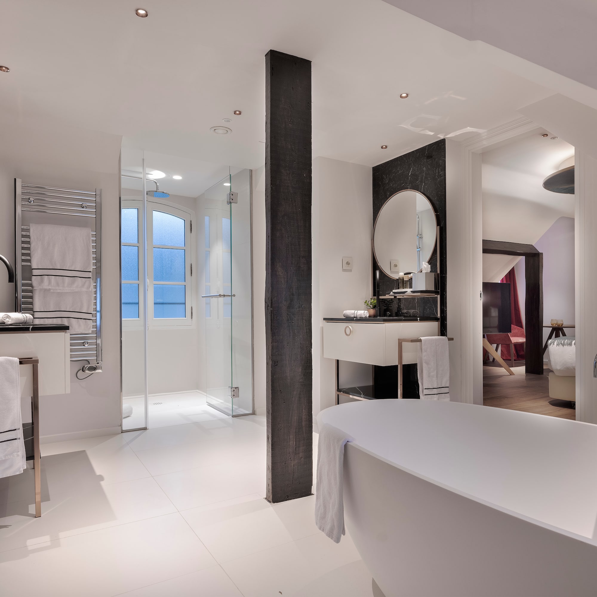 a bathroom with a tub and sink