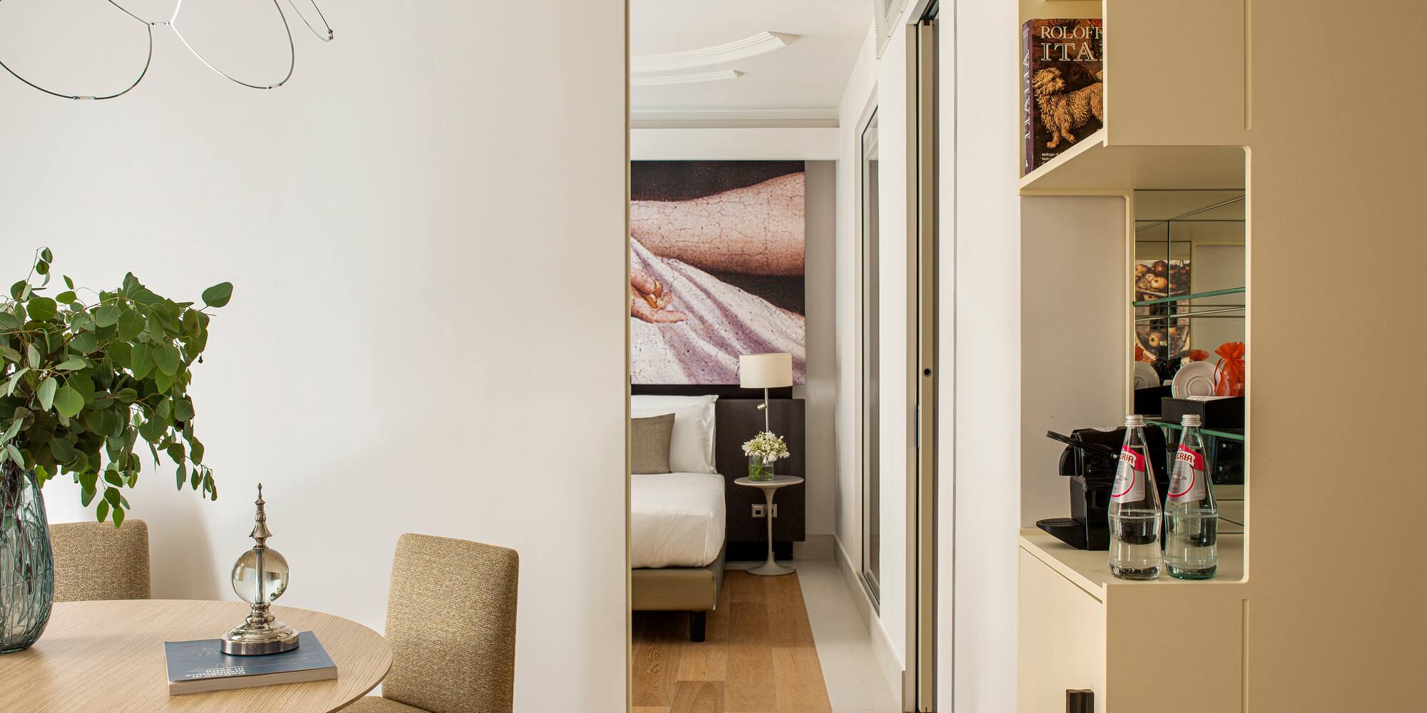 a room with a table and chairs