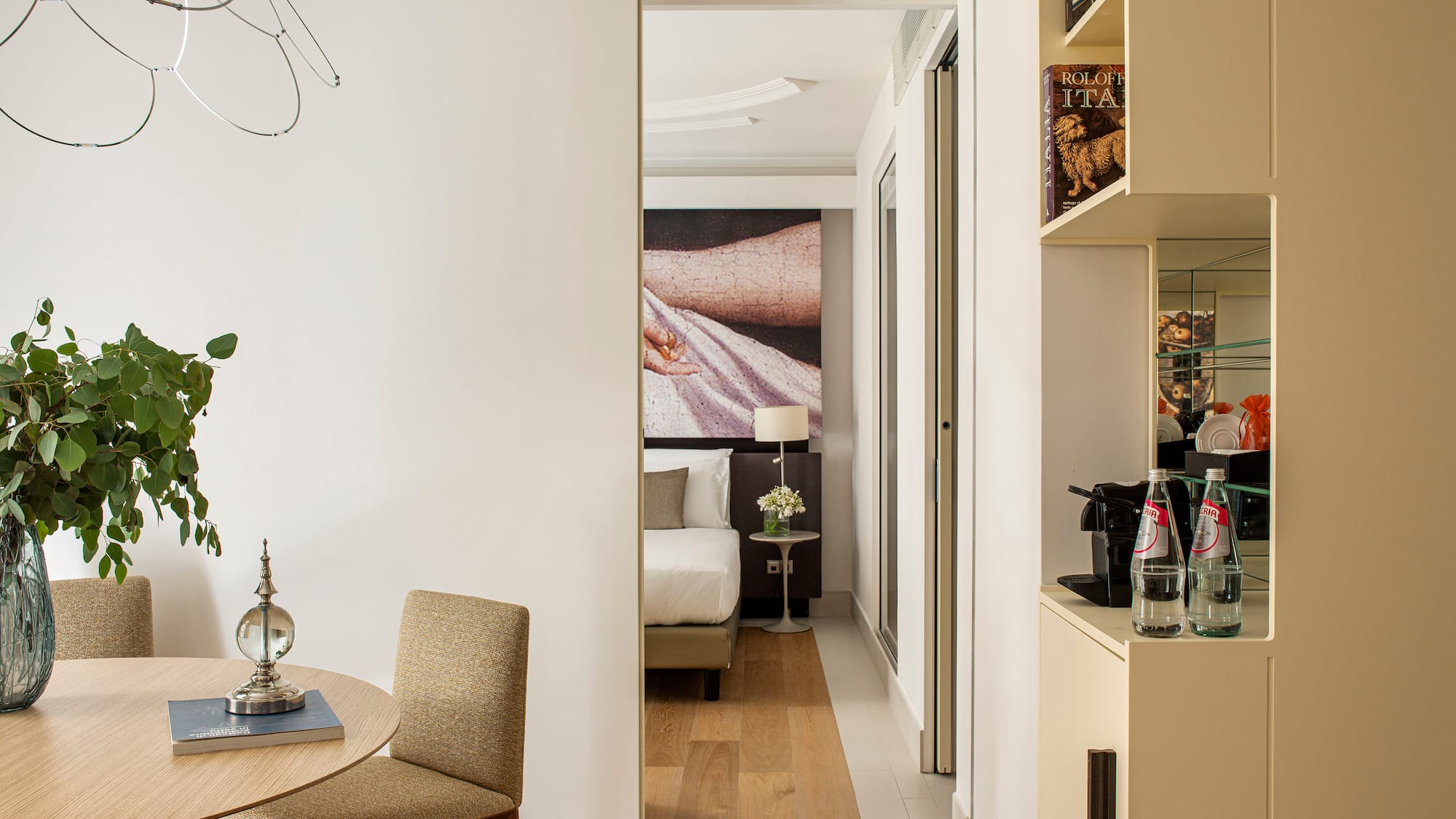 a room with a table and chairs