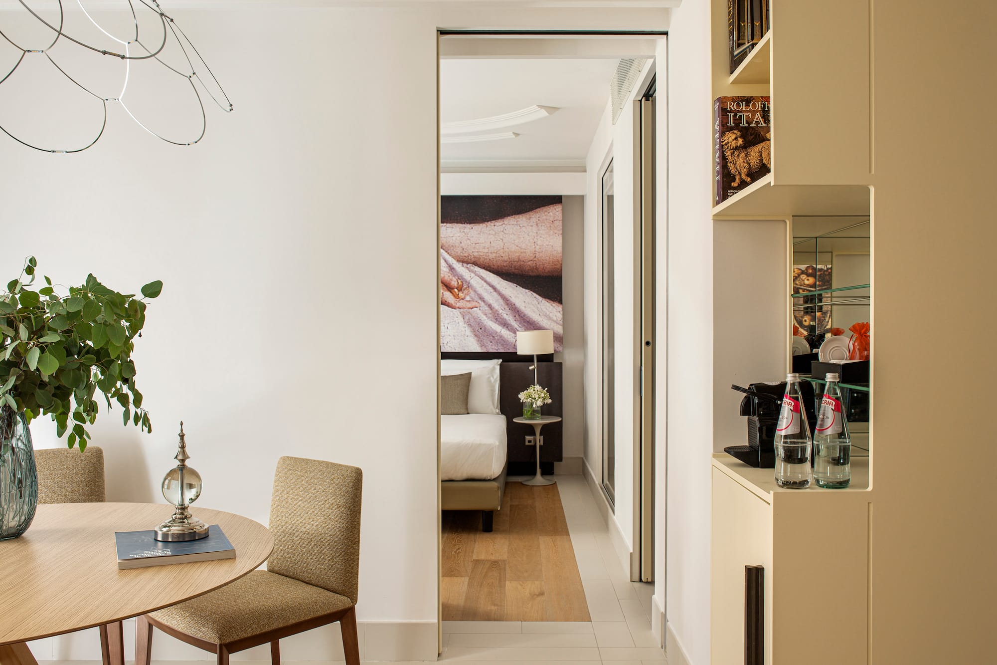 a room with a table and chairs