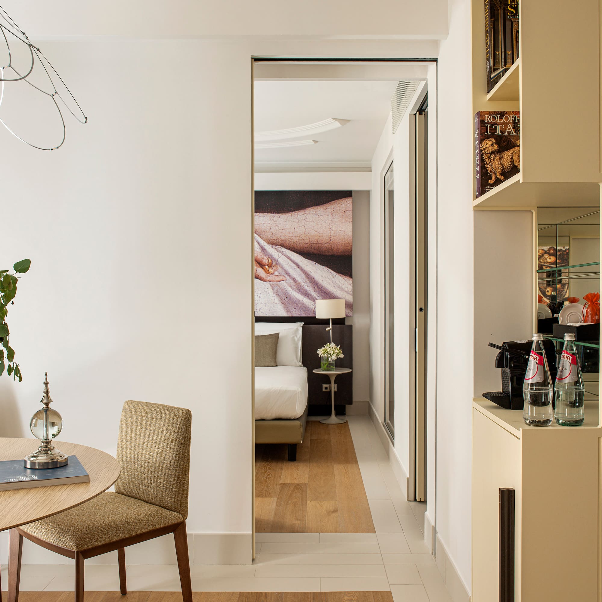 a room with a table and chairs