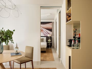 a room with a table and chairs