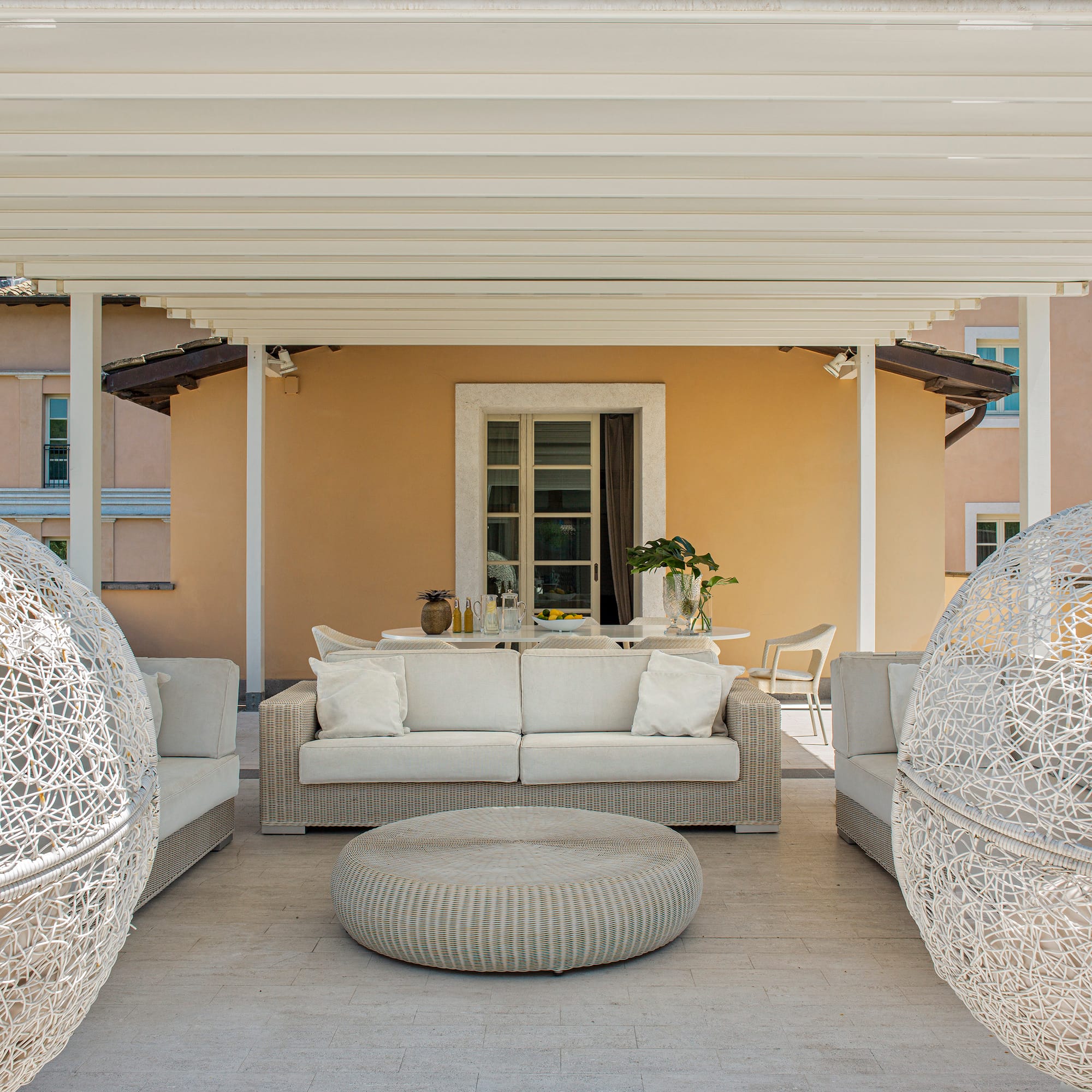 a white furniture on a patio