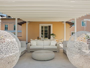 a white furniture on a patio