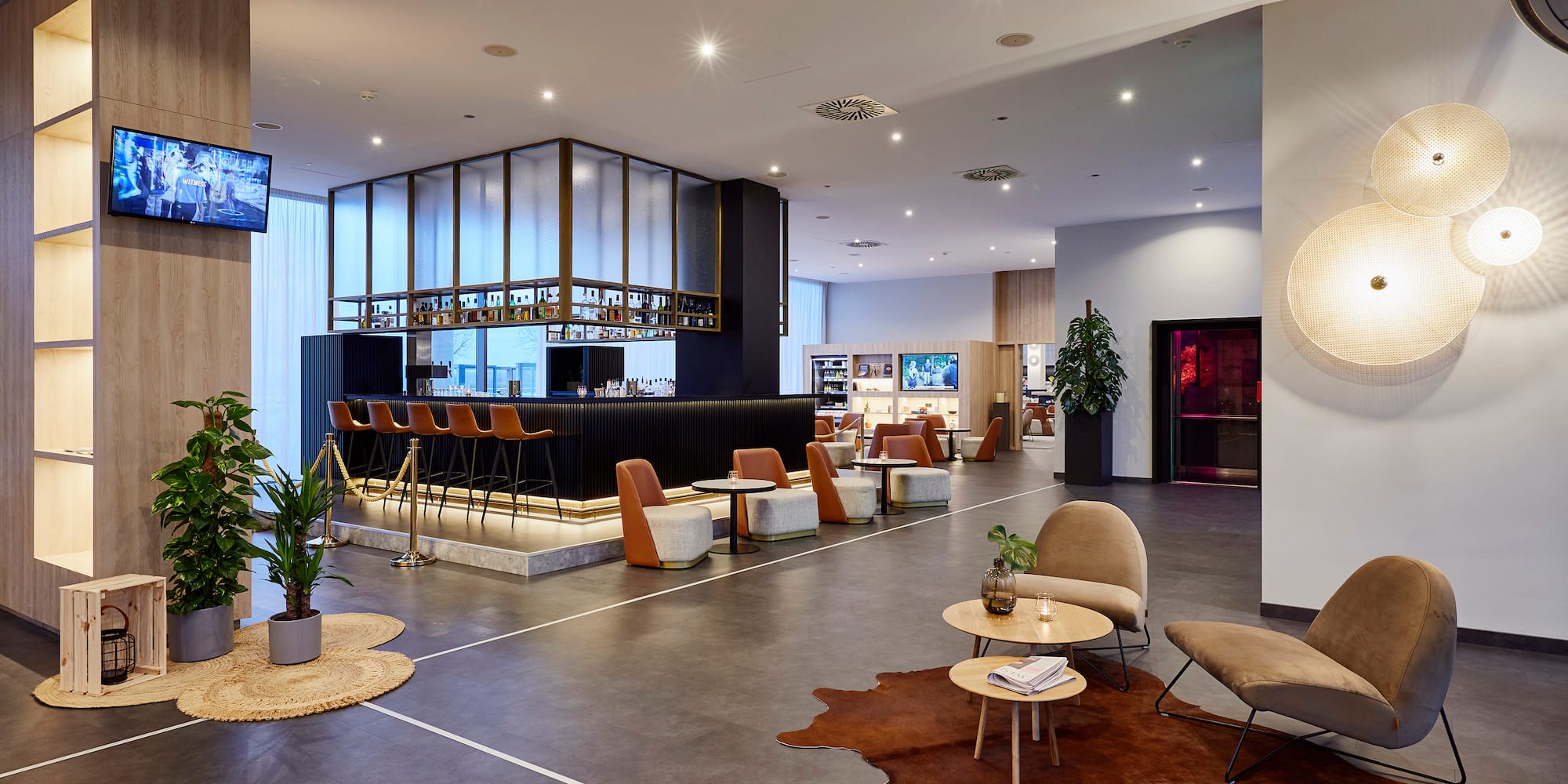 a large room with a large counter and chairs