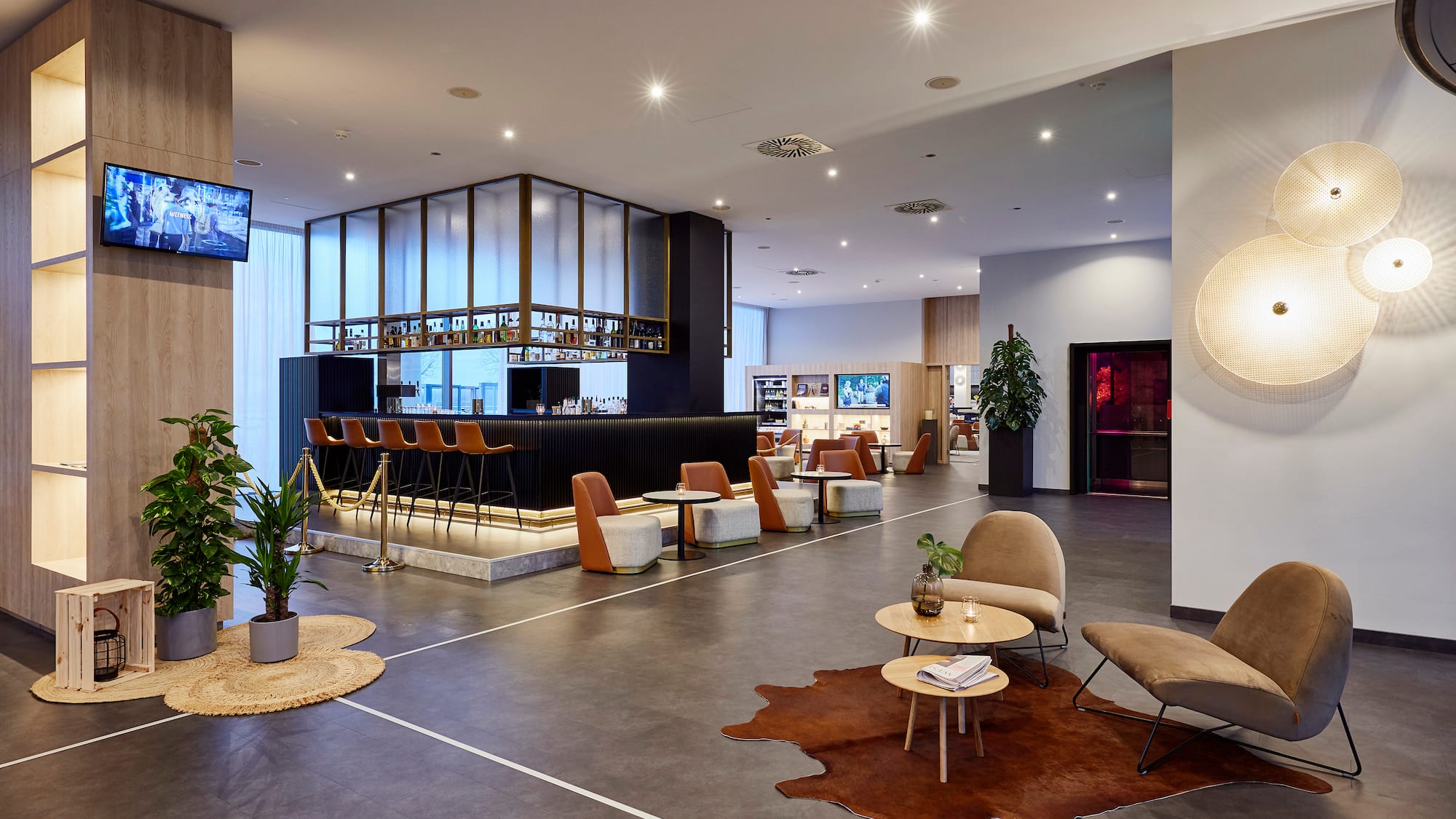 a large room with a large counter and chairs