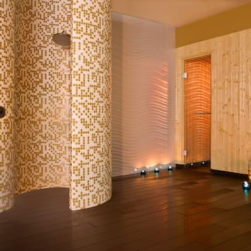 a room with a shower and a door