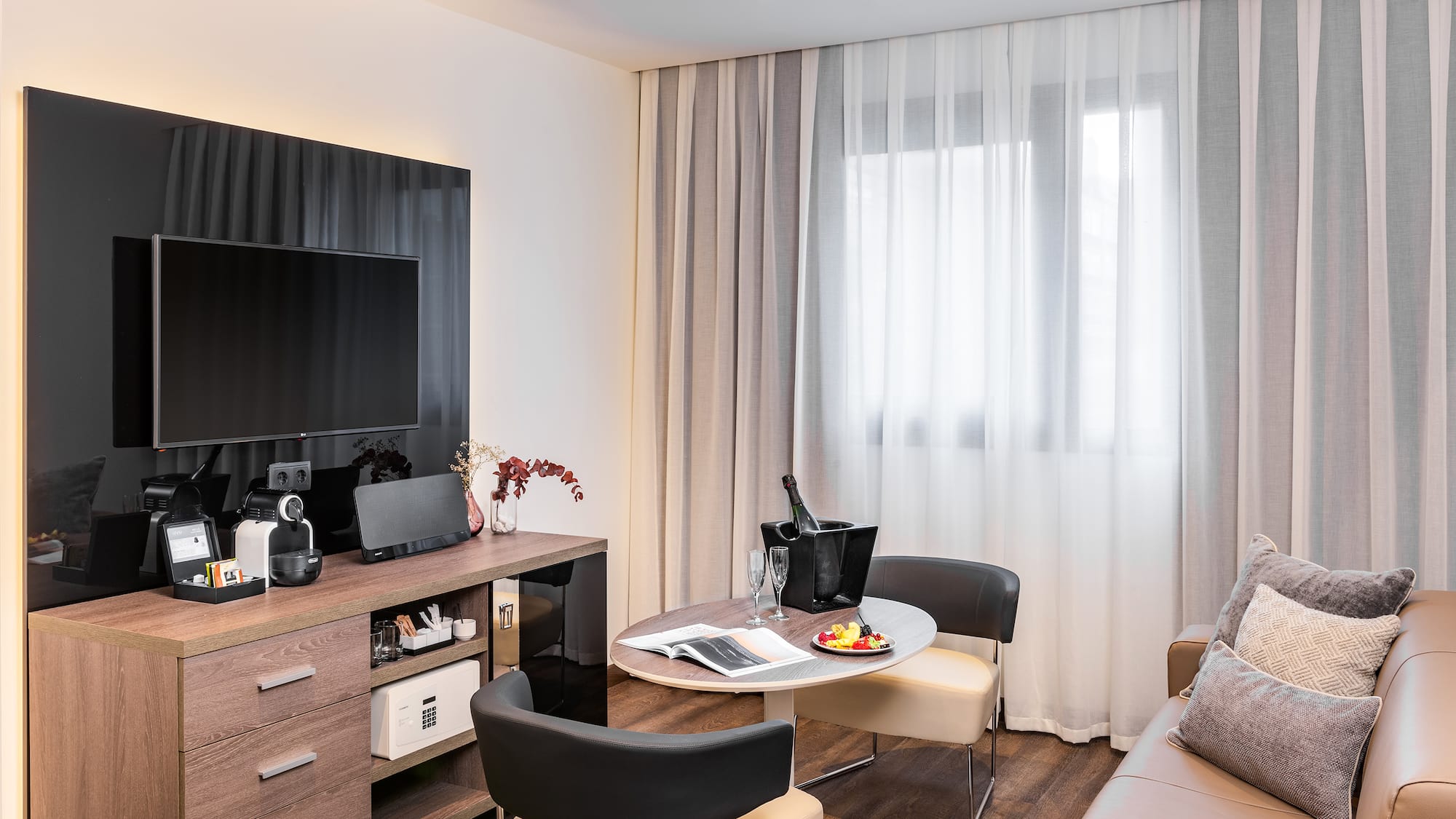 a room with a tv and a table