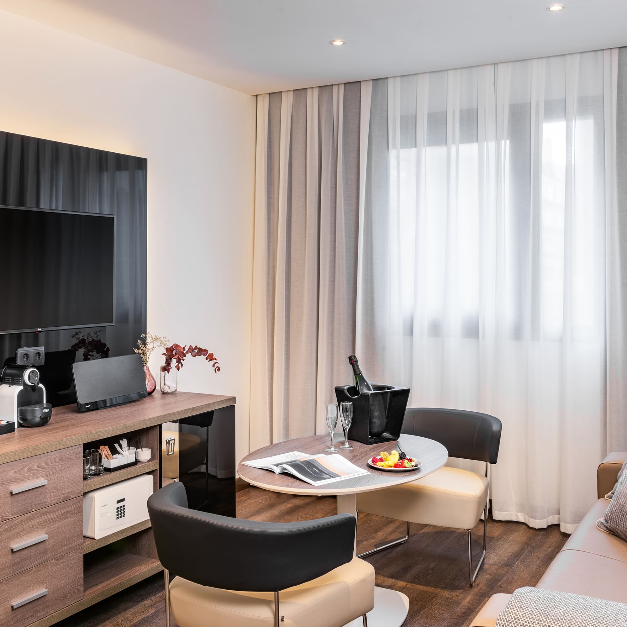 a room with a tv and a table