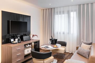 a room with a tv and a table