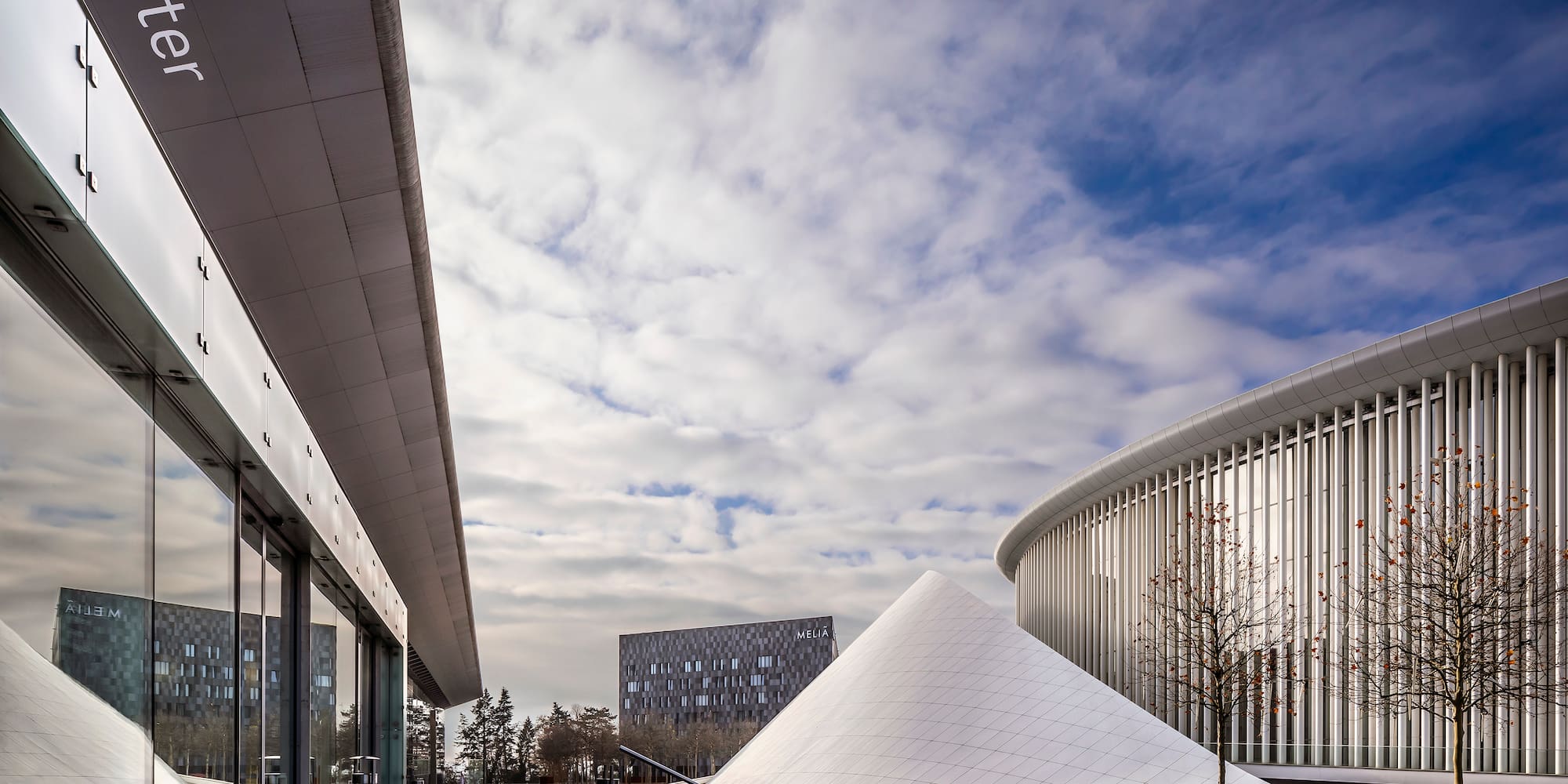 a building with a pyramid in the middle
